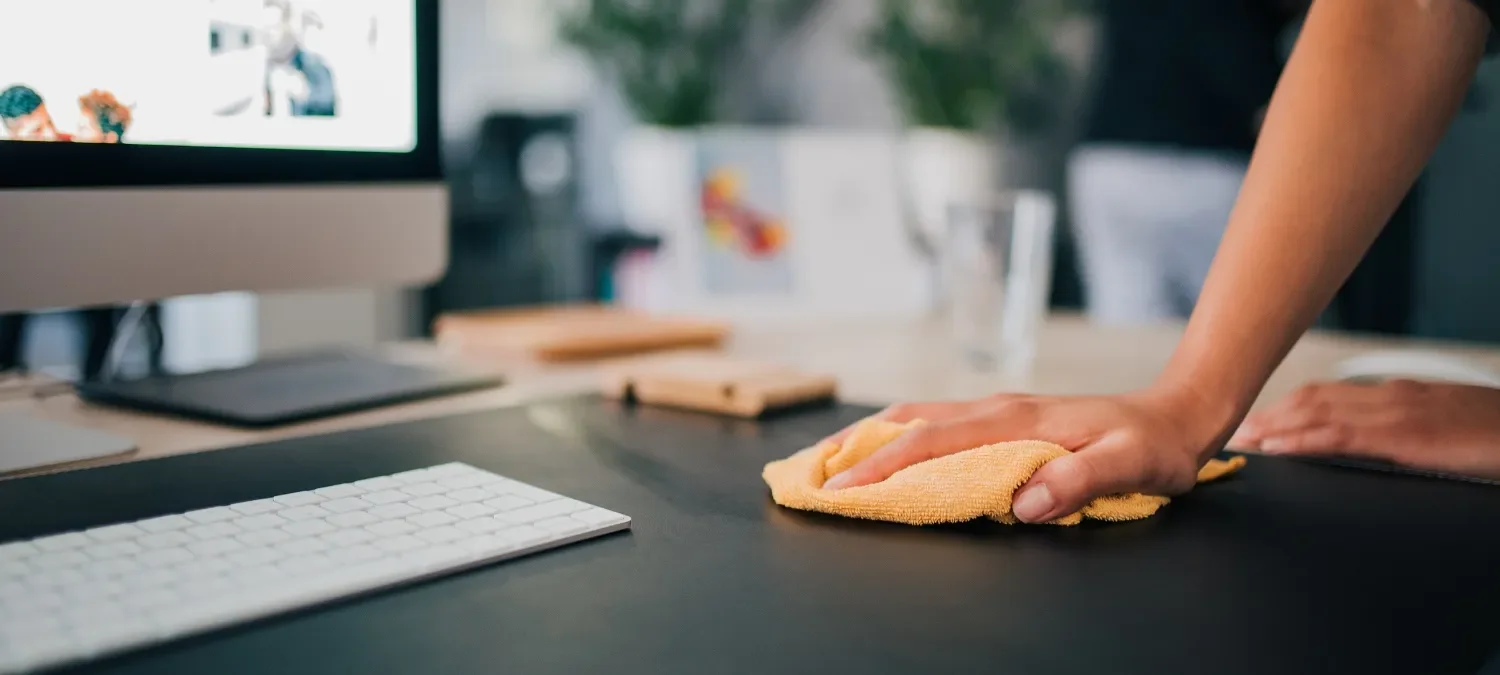 cleaning-an-office-table.webp