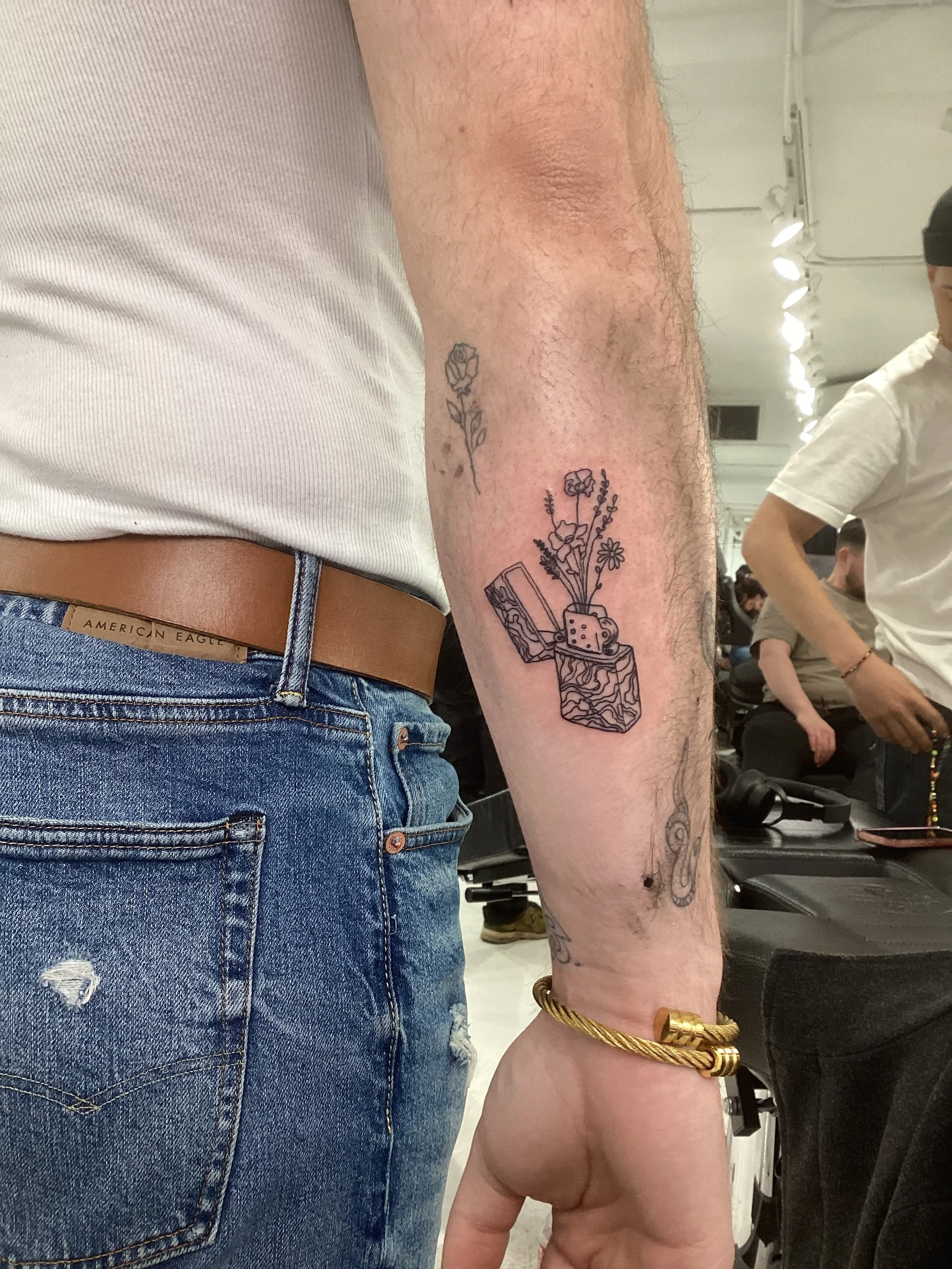 Custom_Fineline_Lighter_Tattoo_Feb2026.jpg