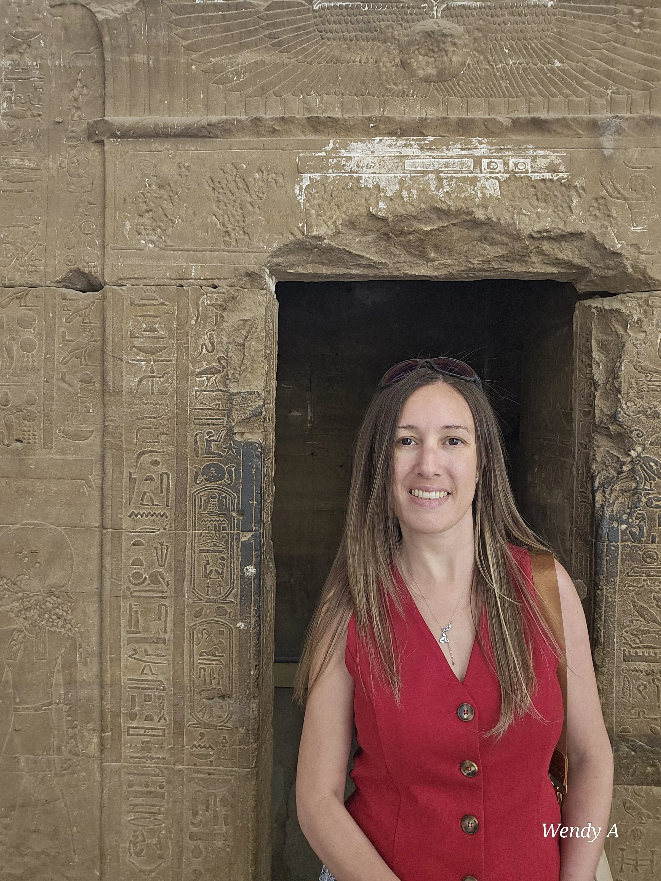 Wendy Adan, custom travel advisor, outside an ancient temple in Egypt