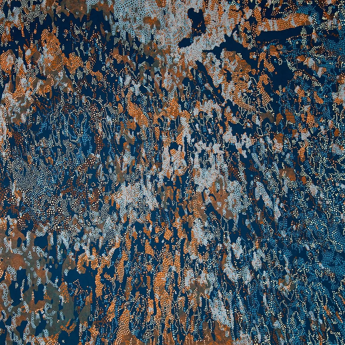 abstract painting of dots in blue, orang, and brown