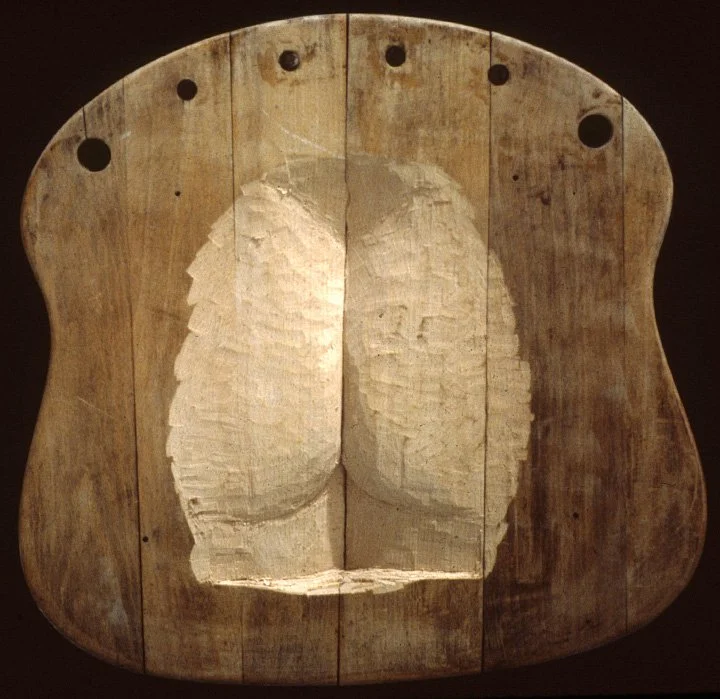 Untitled (buttocks), 1990, carved wood, 16 x 16.5 x 1