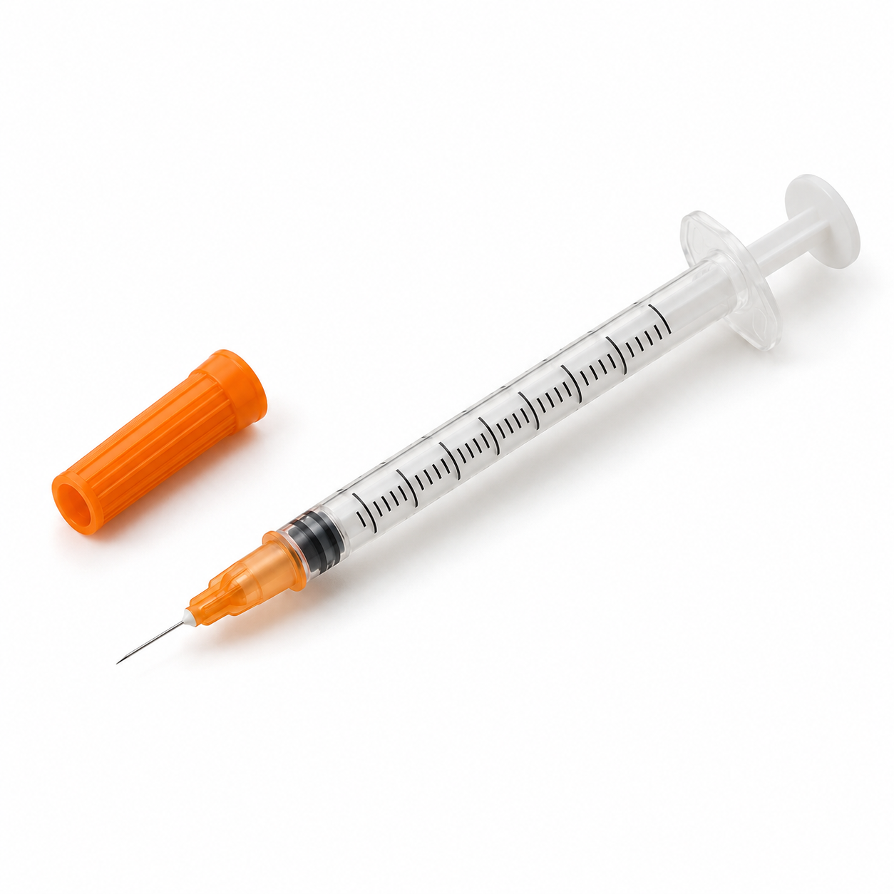Disposable syringe with orange needle cap on a white background.