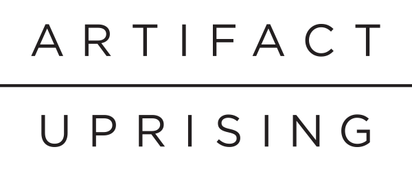 The text 'Artifact Uprising' on a black background.