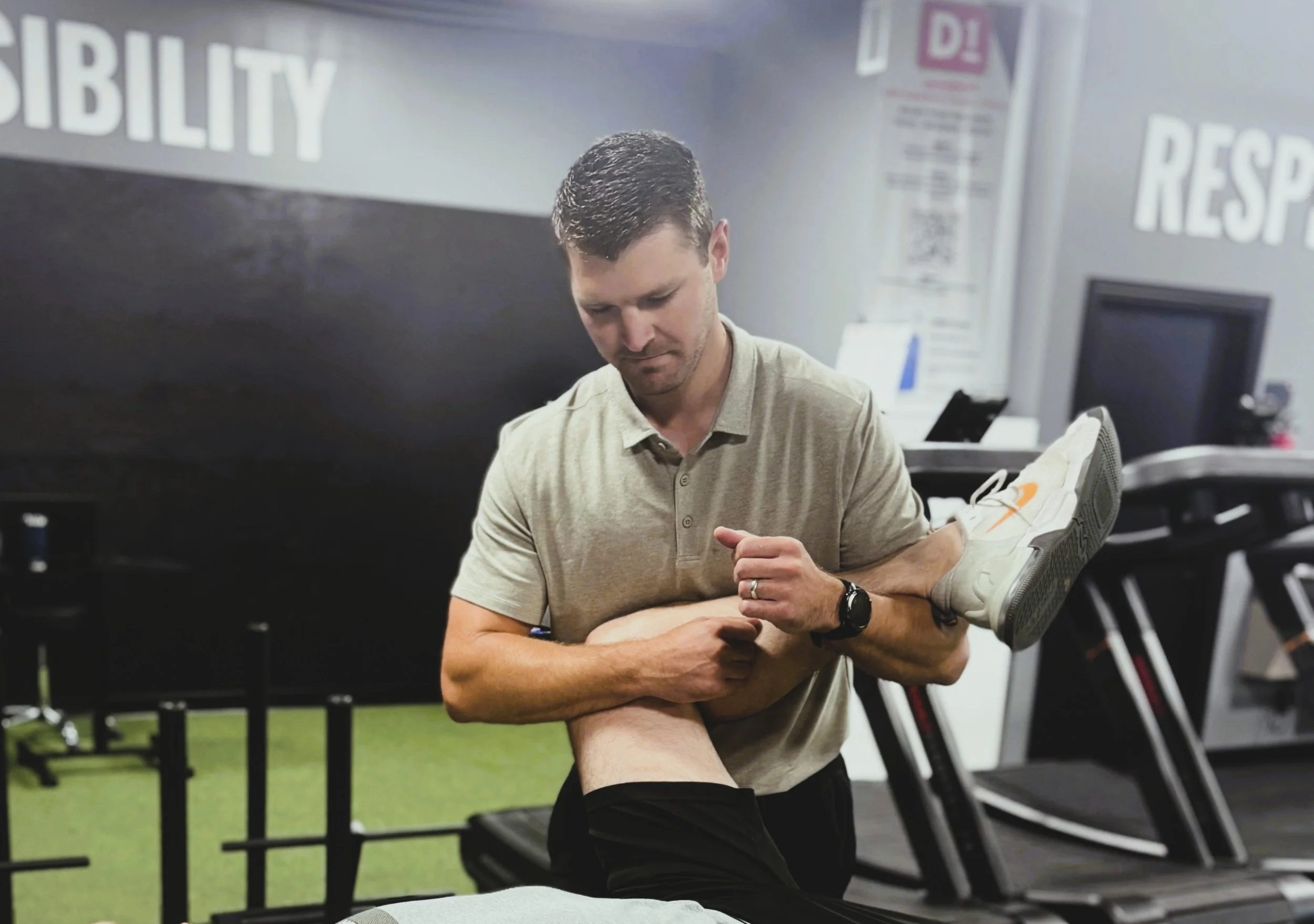 Best Physical therapist in Wichita providing hands‑on mobility treatment for an active adult’s hip and leg to improve movement, reduce pain, and enhance performance at a premium one‑on‑one clinic in east Wichita.