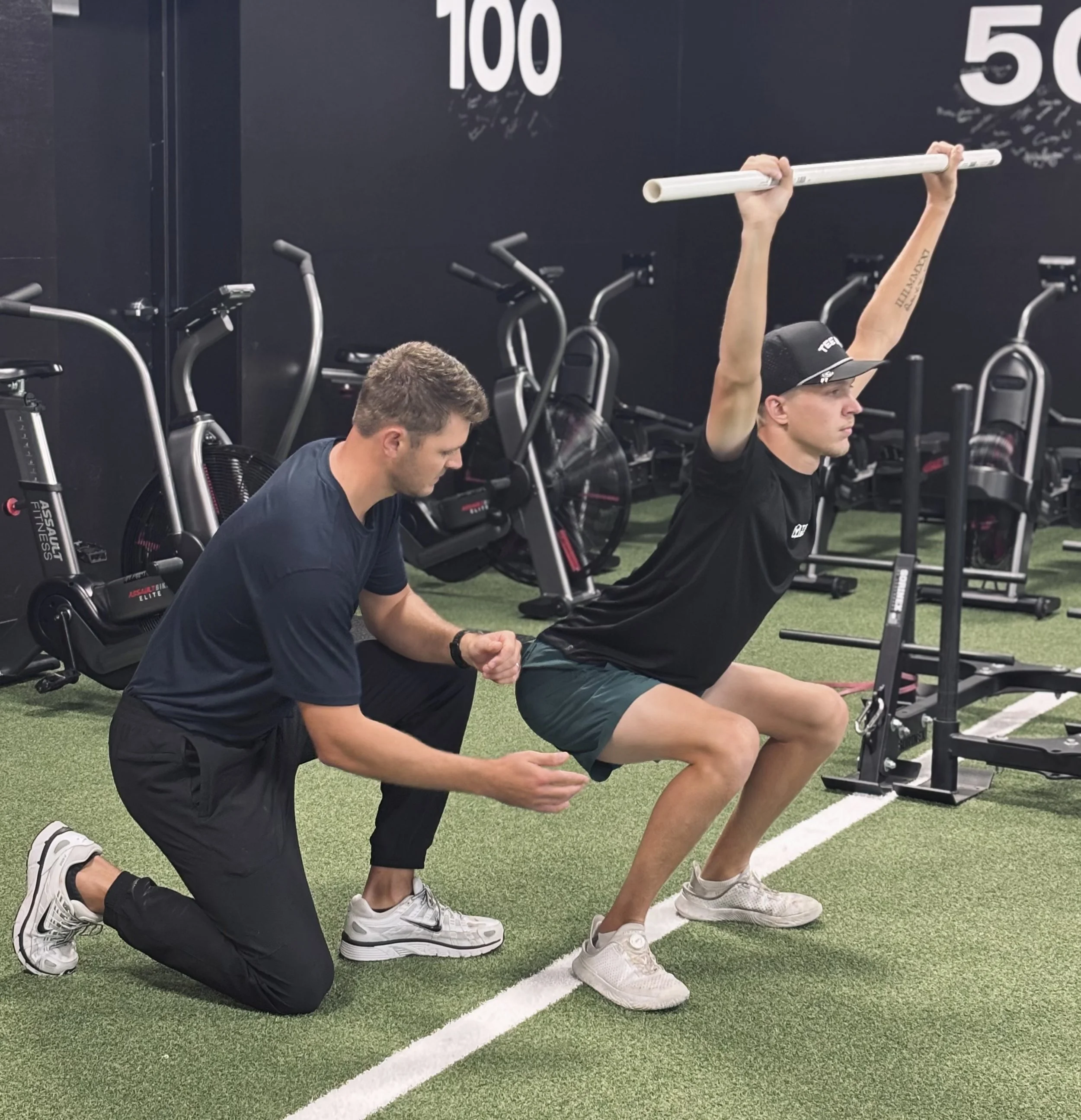 Physical therapist at Precision Physical Therapy in Wichita, KS assessment movement for a golf assessment.