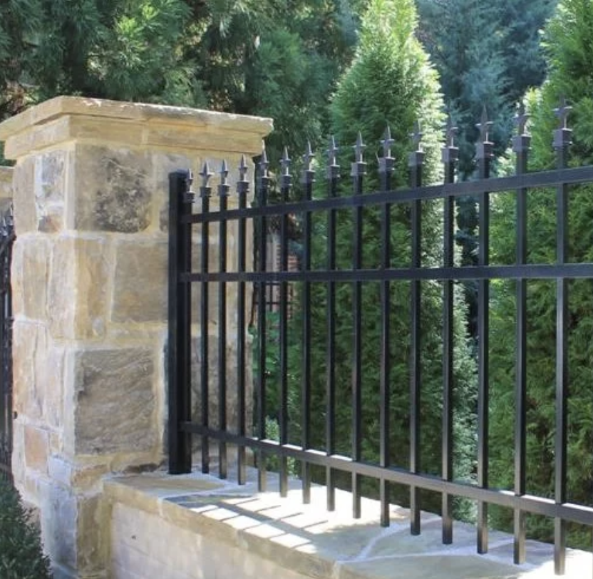 Spear Top Residential Aluminum w/ Tri-Tip Finials & Set On Stone Wall