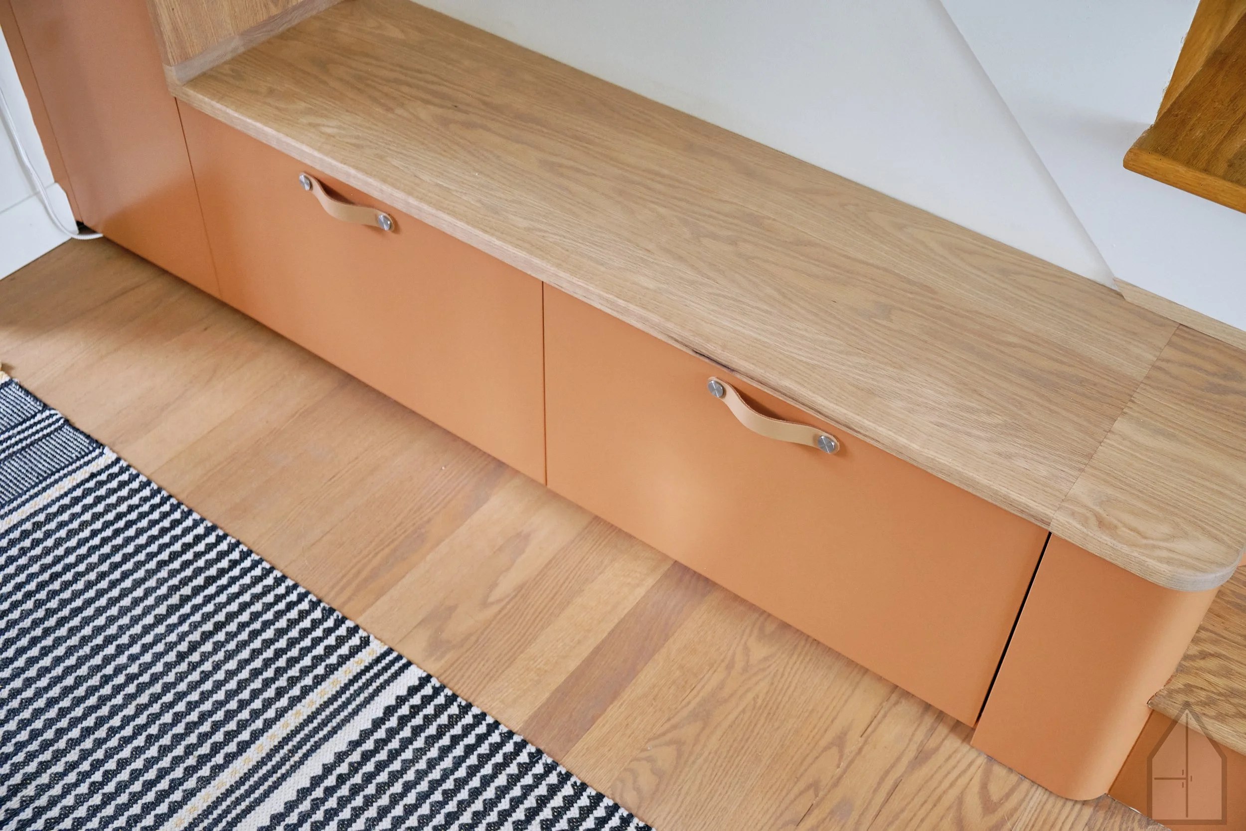 Storage under a integrated bench