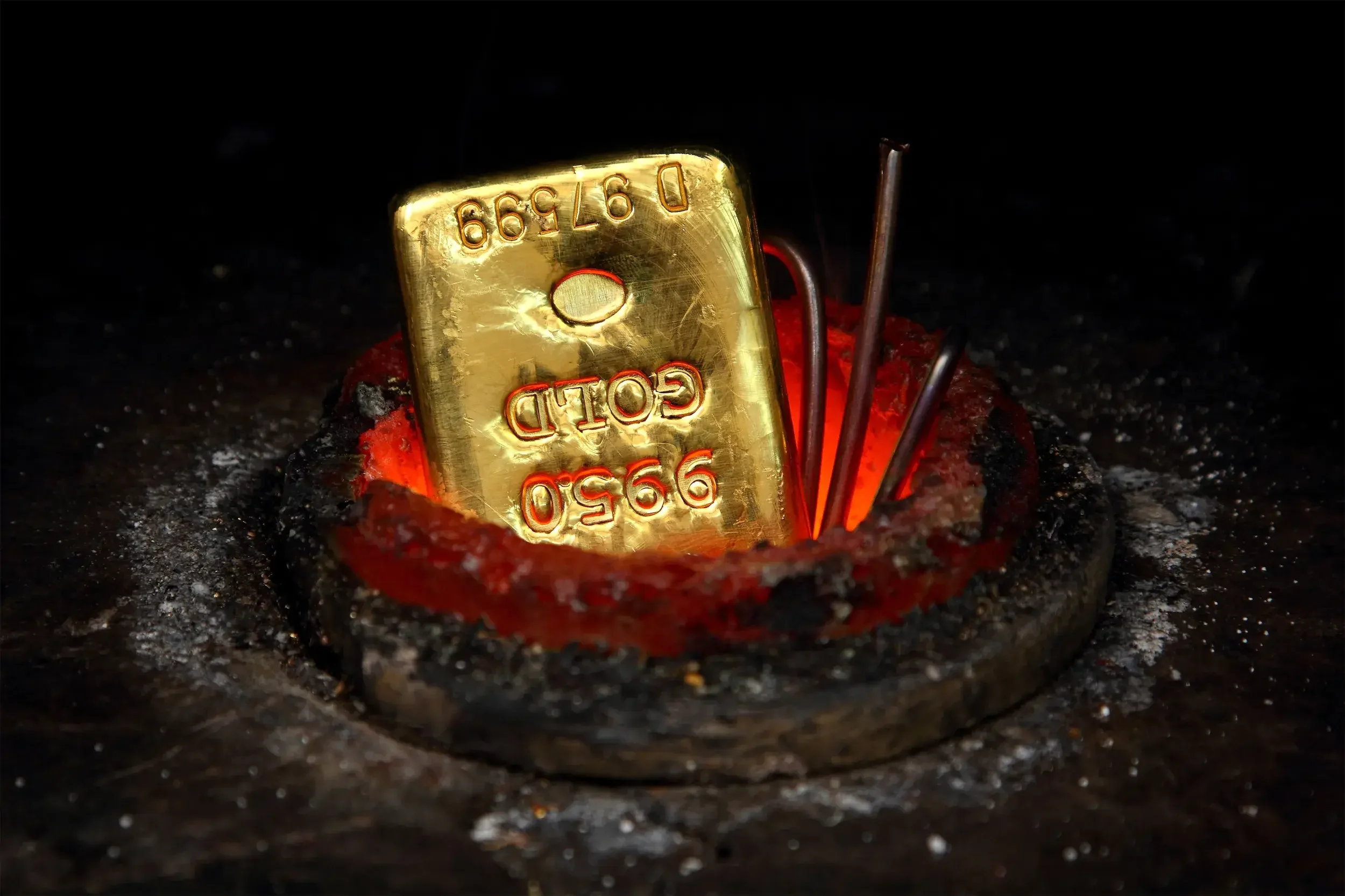 Gold bar being heated during precious metals refining | Downtown Los Angeles Gold, Silver & Coin Buyers