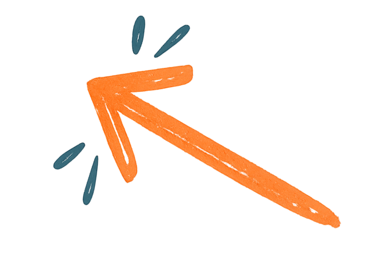 An orange chalk drawing of a downward trending arrow on a black background with blue chalk highlights.