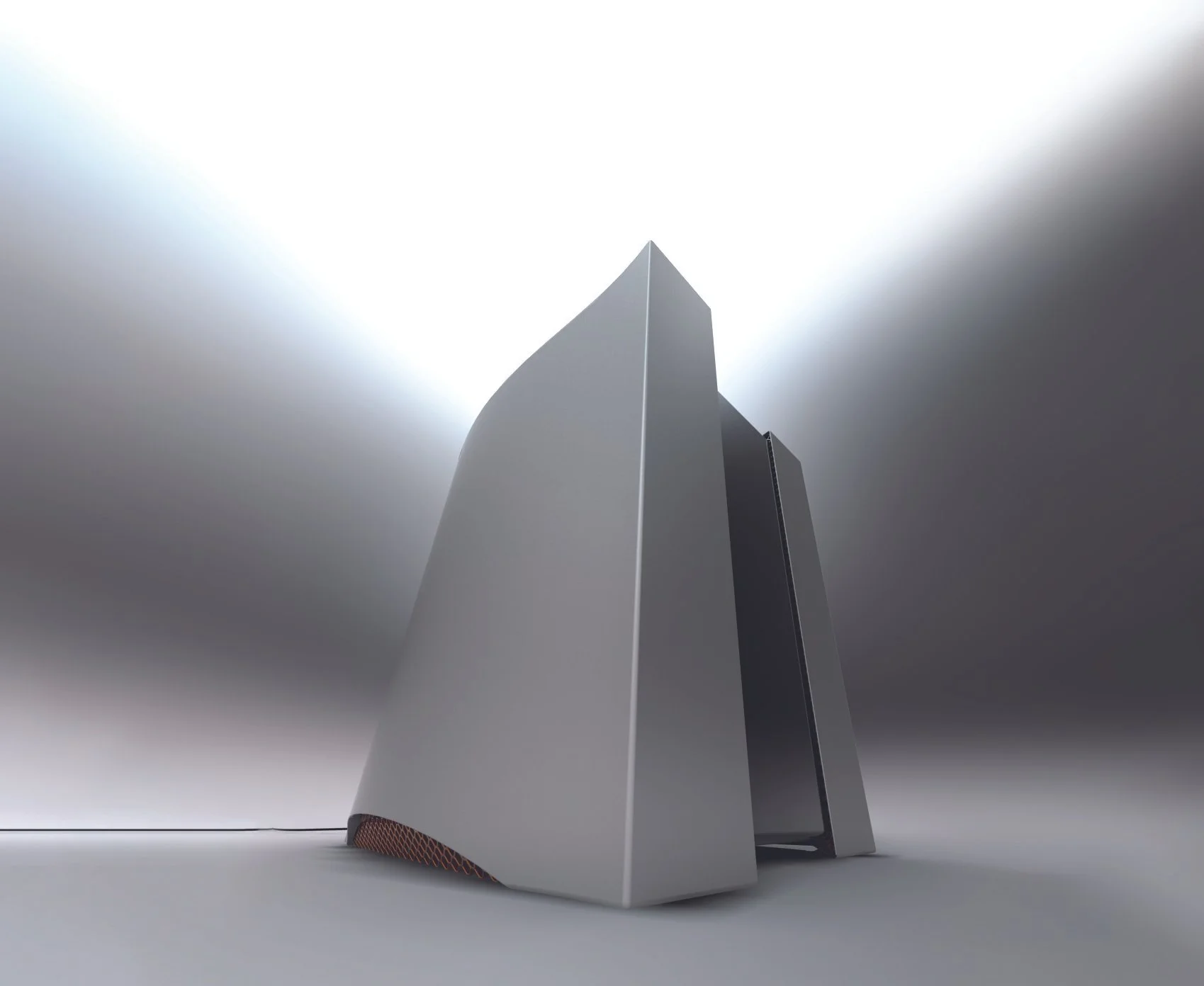 A sleek, modern gaming computer tower with a metallic silver finish, orange accents at the bottom vent, viewed from a low angle against a minimalistic, diffused light background.