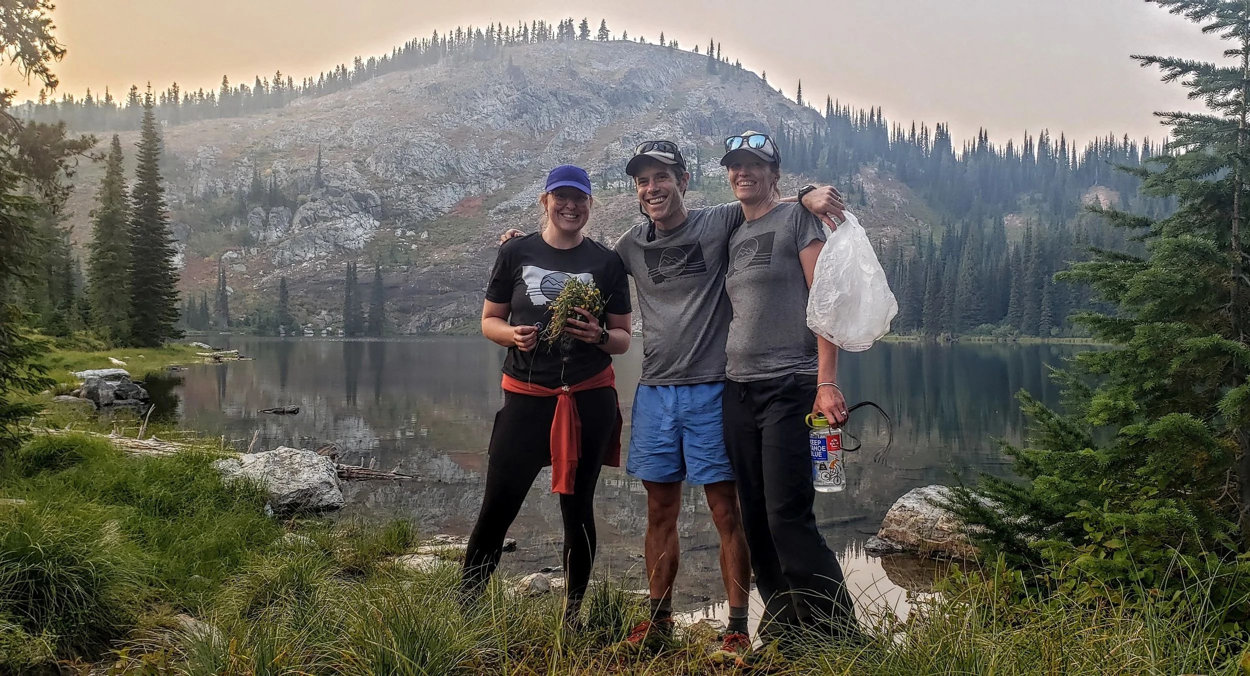 Volunteers_lake_weeds_smile (1).jpg