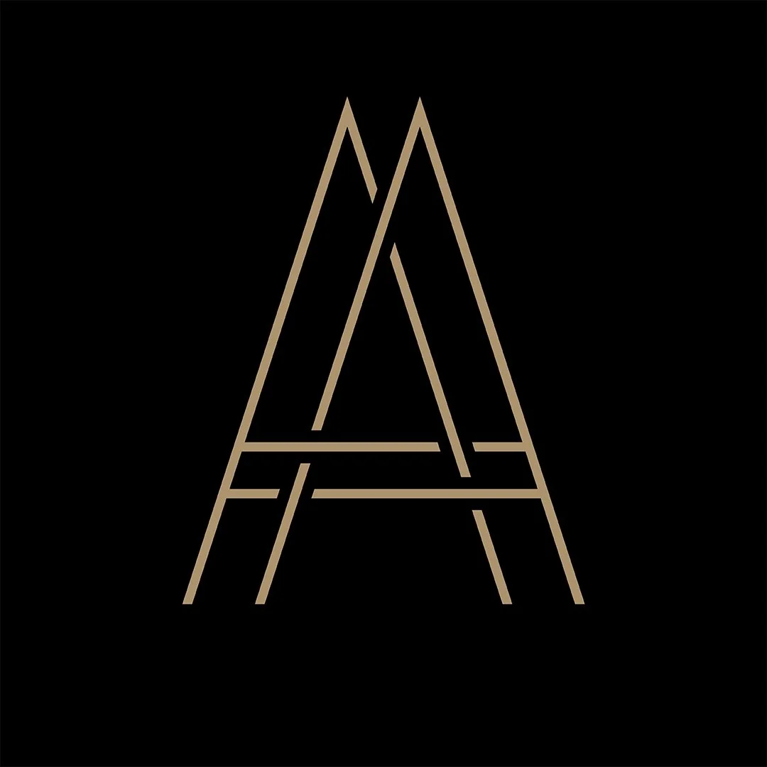 A stylized, geometric letter 'A' made of gold lines on a black background.
The logo of the renowned luxury boutique hotel Alhambra in Mali Lošinj. Known also for its Michelin-starred restaurant.