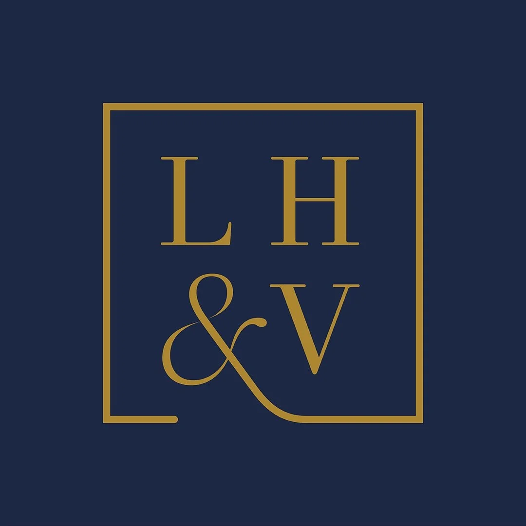 Logo with gold letters L, H, V, and ampersand inside a gold square outline on a dark blue background.