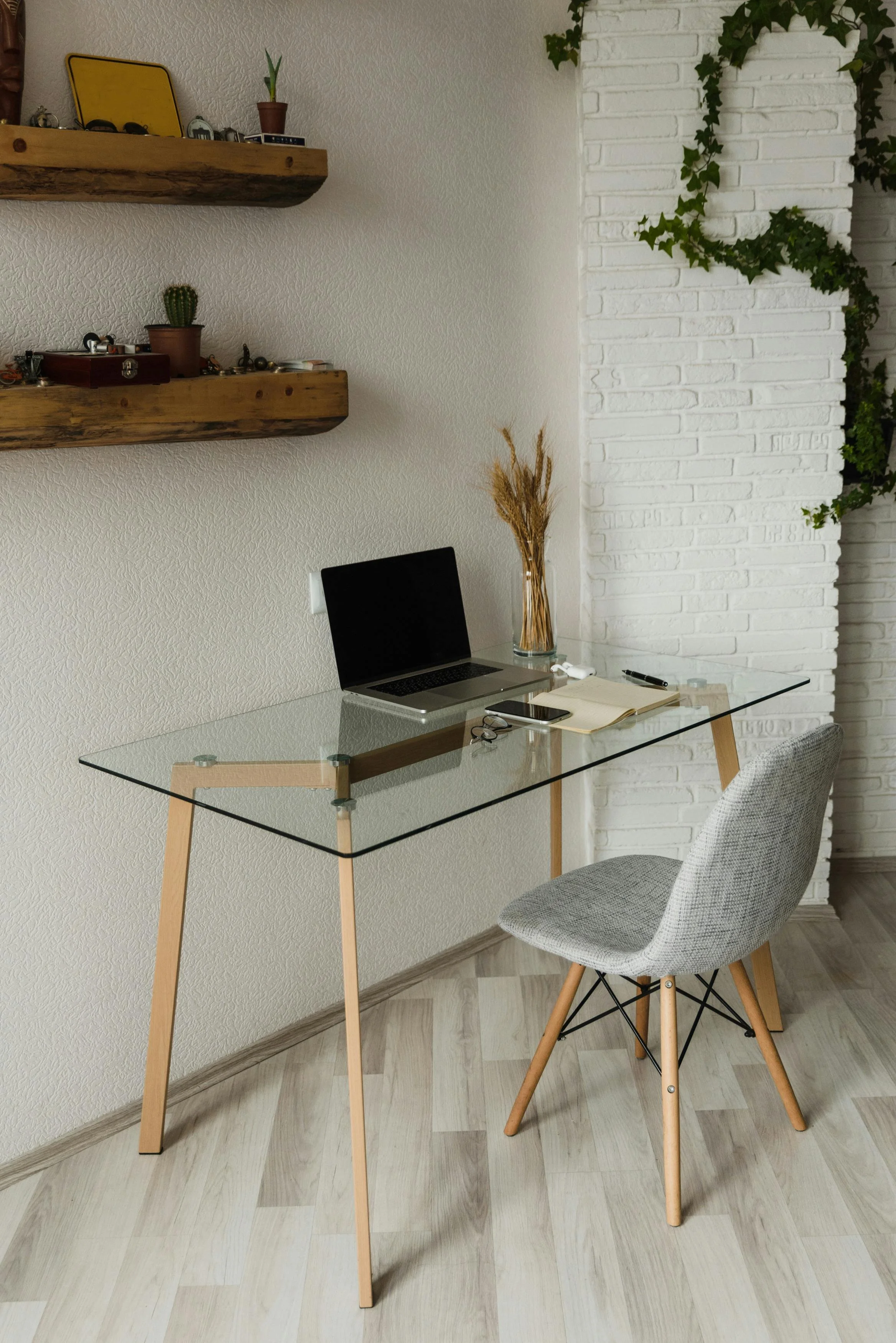 Clean home office workspace representing virtual telehealth therapy sessions