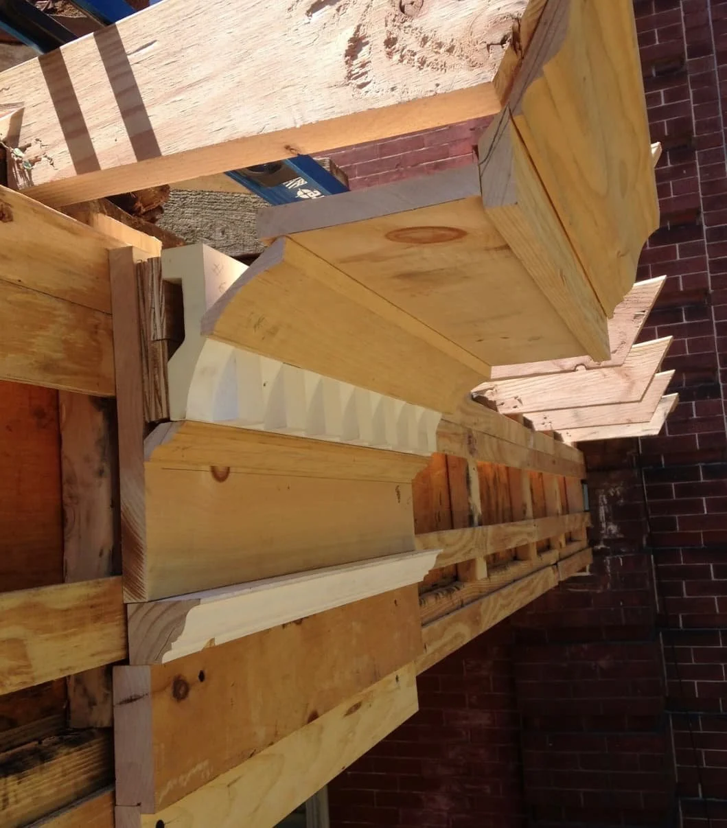 Custom porch trim and architectural woodwork being reconstructed during a Doylestown, PA exterior restoration project.