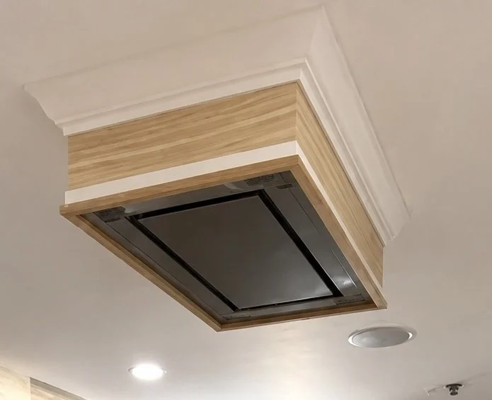 Close-up of a customer range hood and cabinetry installed by JWD Contractors during a Perkasie, PA kitchen remodel.