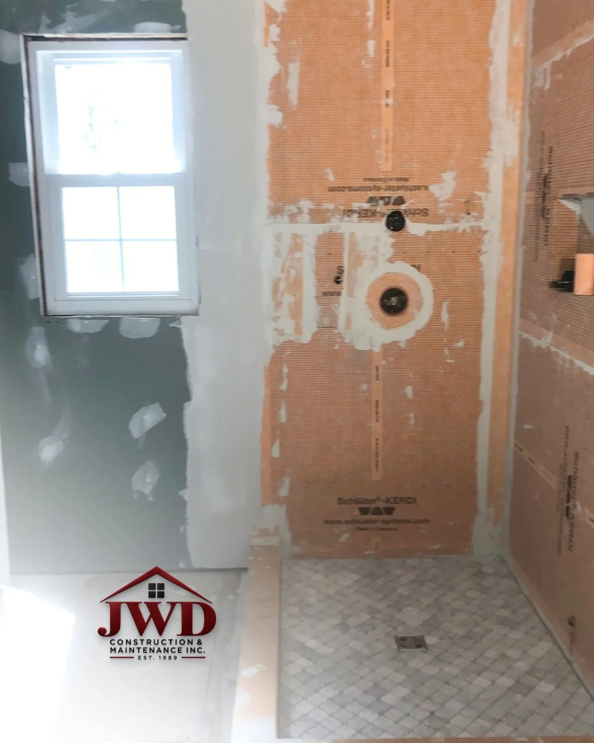 Walk-in shower waterproofing by JWD Contractors during an Upper Moreland, PA bathroom remodel.