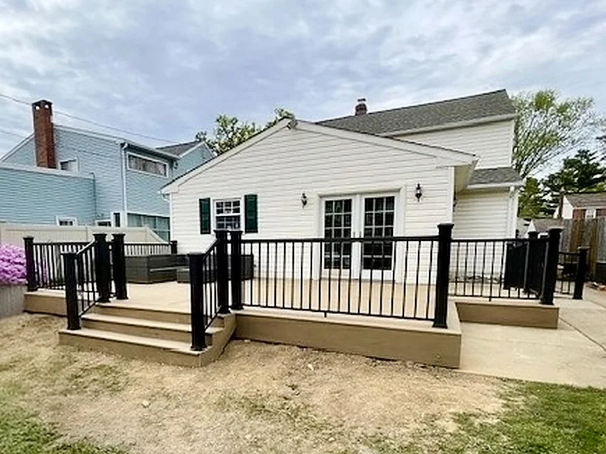 A composite deck completed by JWD Contractors with sharp contrast and beautiful design.