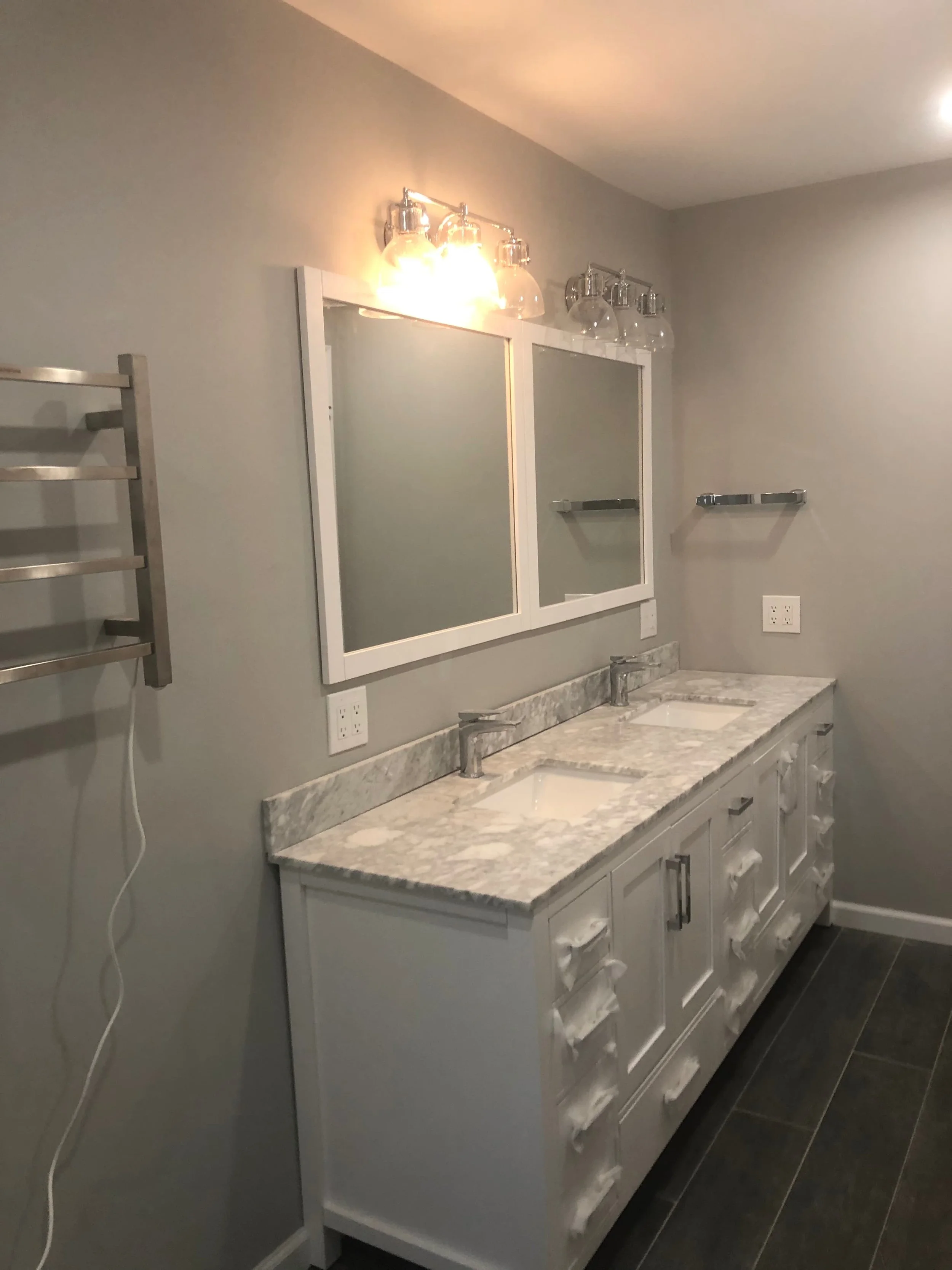 white vanity, dual sink, dual mirrors in bathroom remodel in Hatboro, PA