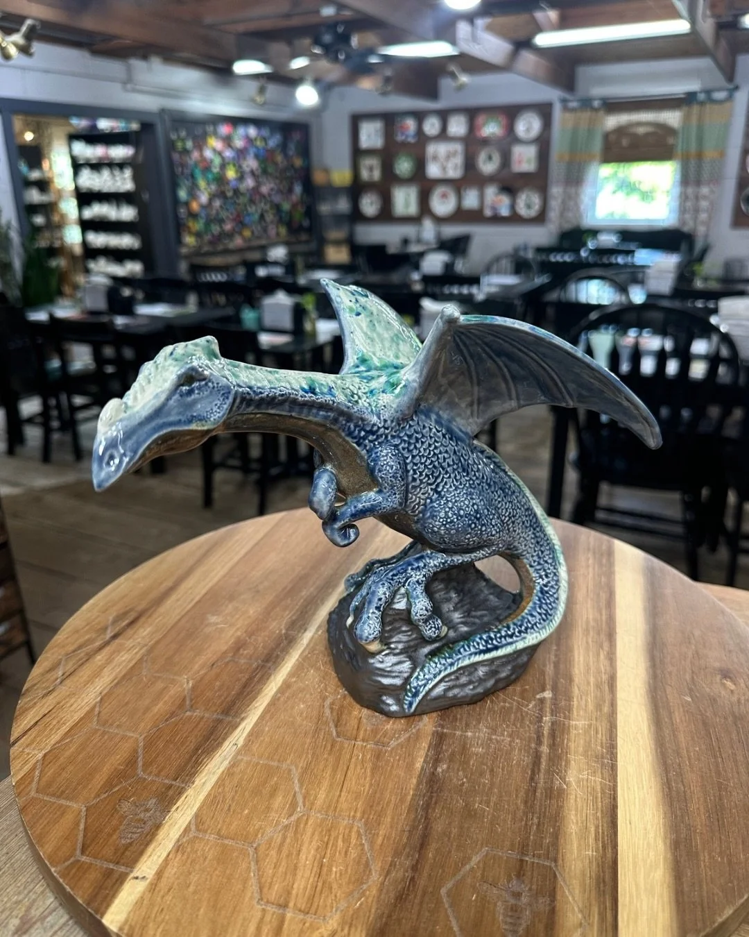 This dragon painted with our specialty and crystal glazes turned out SO cool 😍🎨

I love how the way the blue settled really brings out the scales on the dragon, and the rock looks so realistic! 

We love when people get creative with the glazes! 

