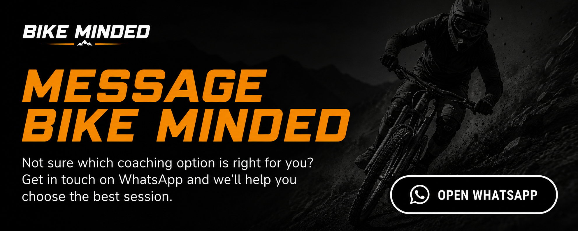 Dark background with a mountain biker wearing full gear riding on a rocky trail at night. Overlaid text says 'Message Bike Minded' in bold orange and white letters, with a WhatsApp icon and 'Open WhatsApp' button.