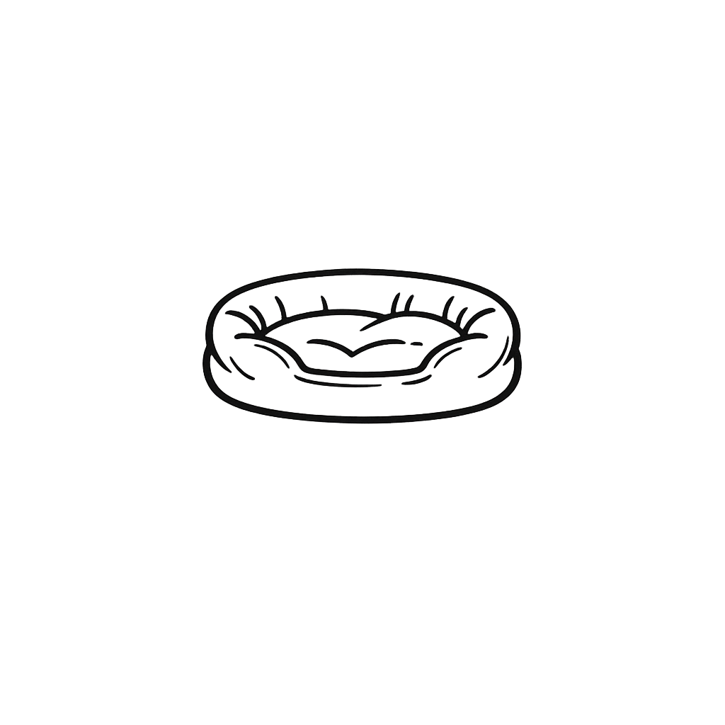 Black and white line drawing of a cute, smiling, cartoon-style face inside a circular object, possibly a pet bed or cushion.