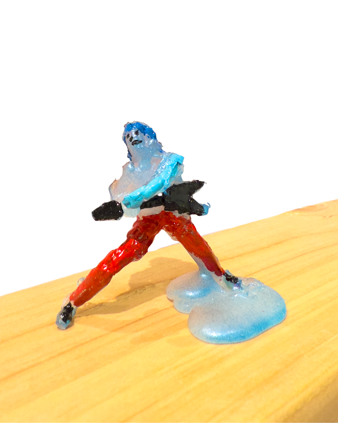 Funk Guitarist Flying V | 
2025 | 
hot glue, enamel | 
3 x 2 x 1.5 inches | 
(Collection of the Gallery,Not for Sale)