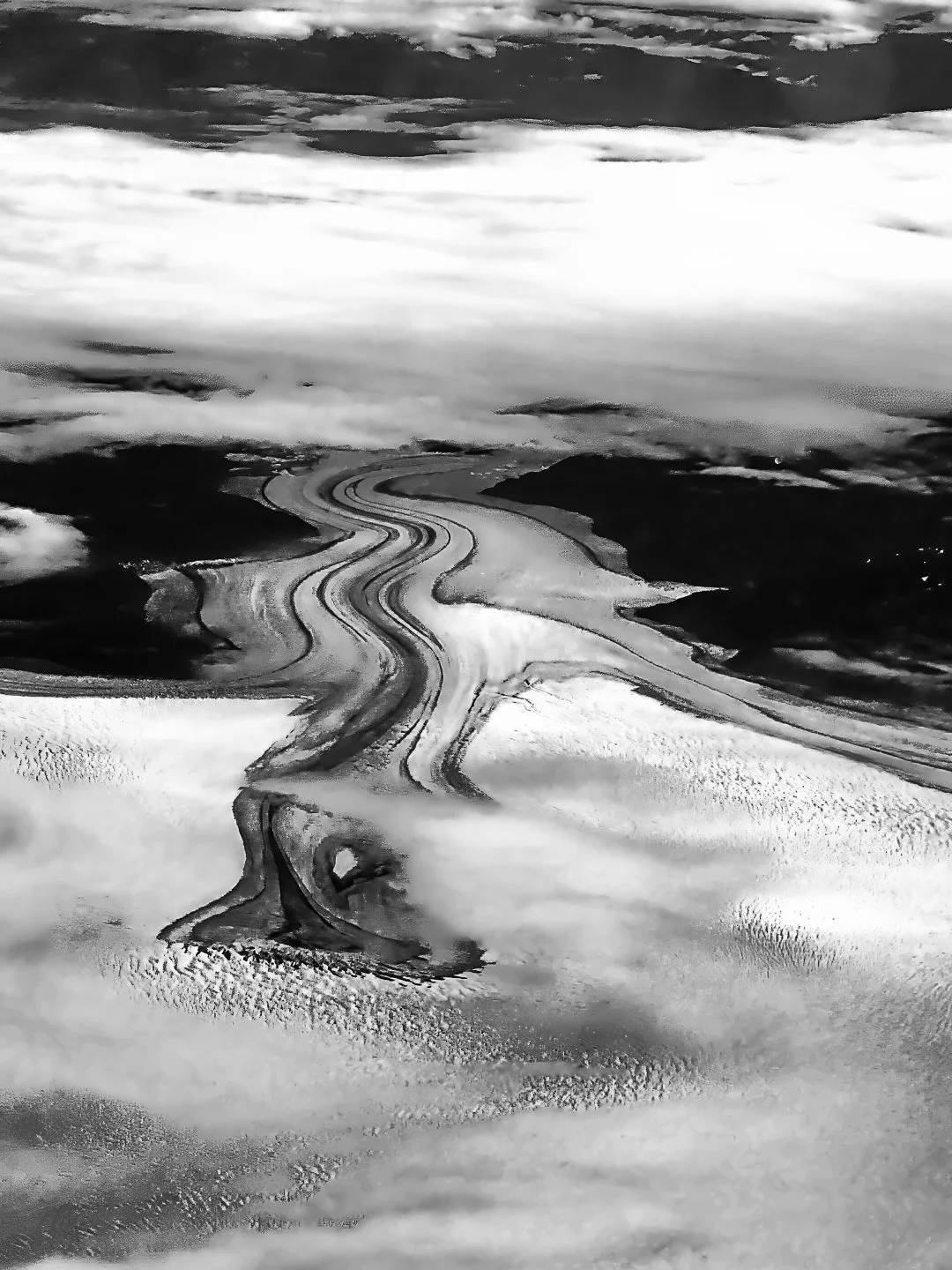 Glacier winding it's way to the Pacific Ocean (from plane over Chile)