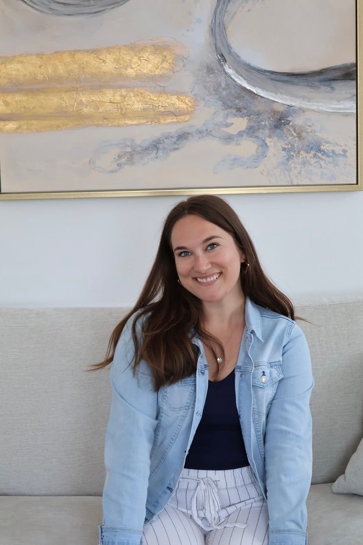 Professional headshot of therapist in neutral, natural lighting