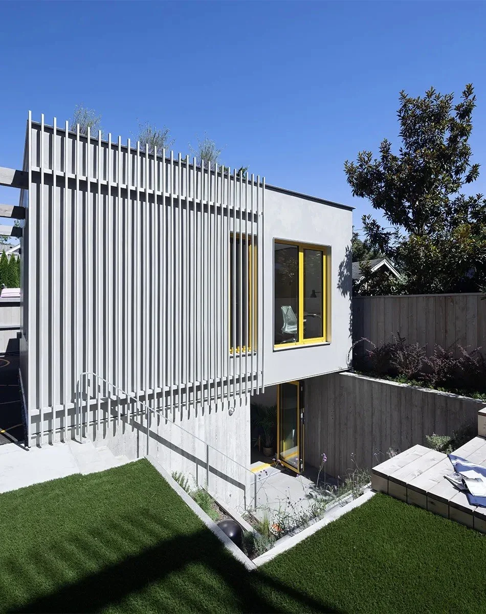 1808-FlexHouse-Exterior+Laneway.webp