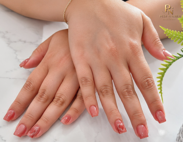 Pink manicure with nail art created at Pedi N Nails Mapleview West