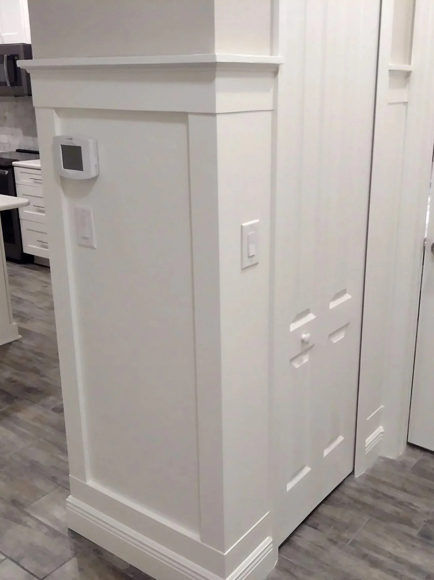 Board and batten walls give a classic look to an otherwise modern home.
