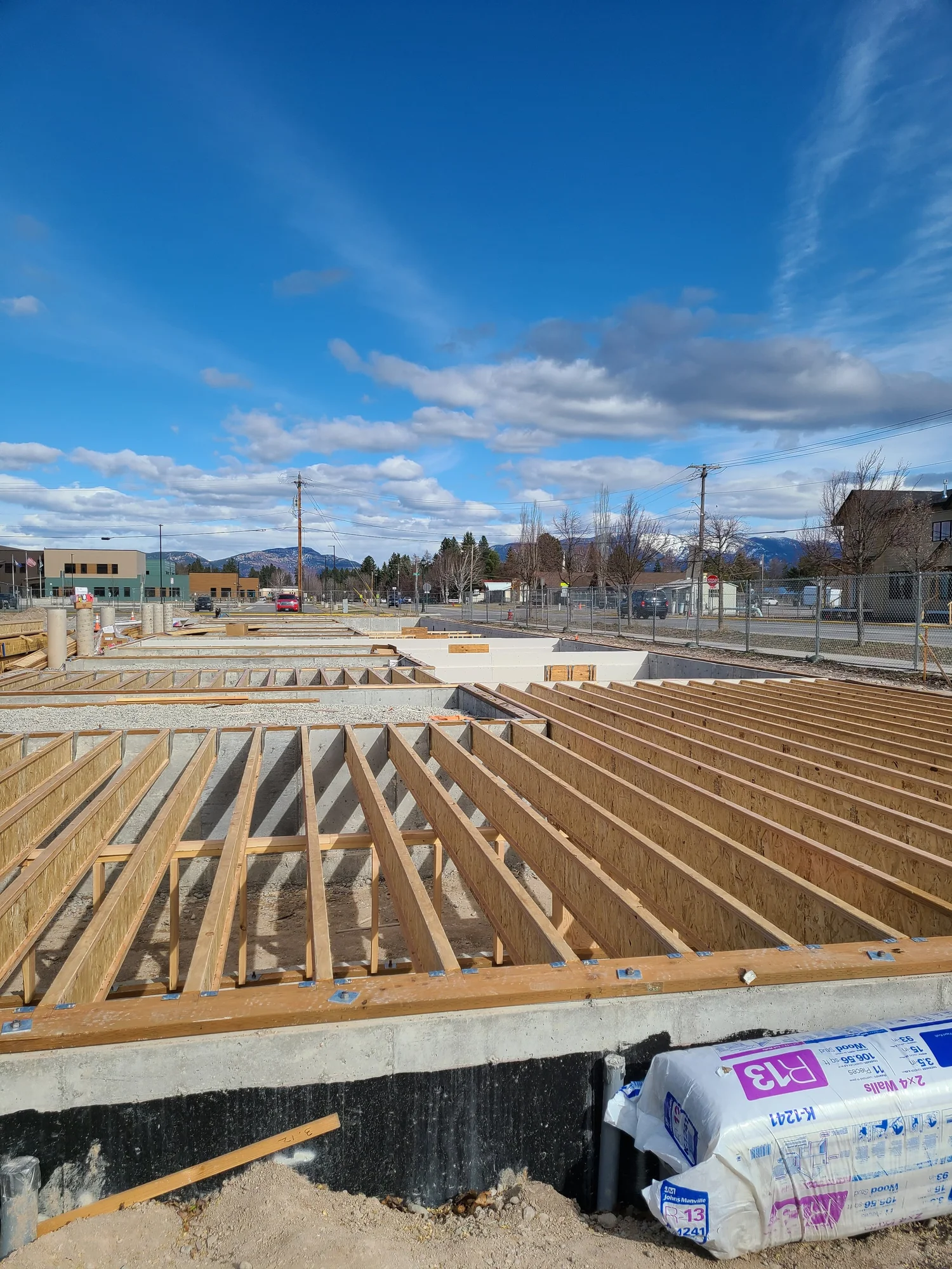 Floor joist system over a new foundation