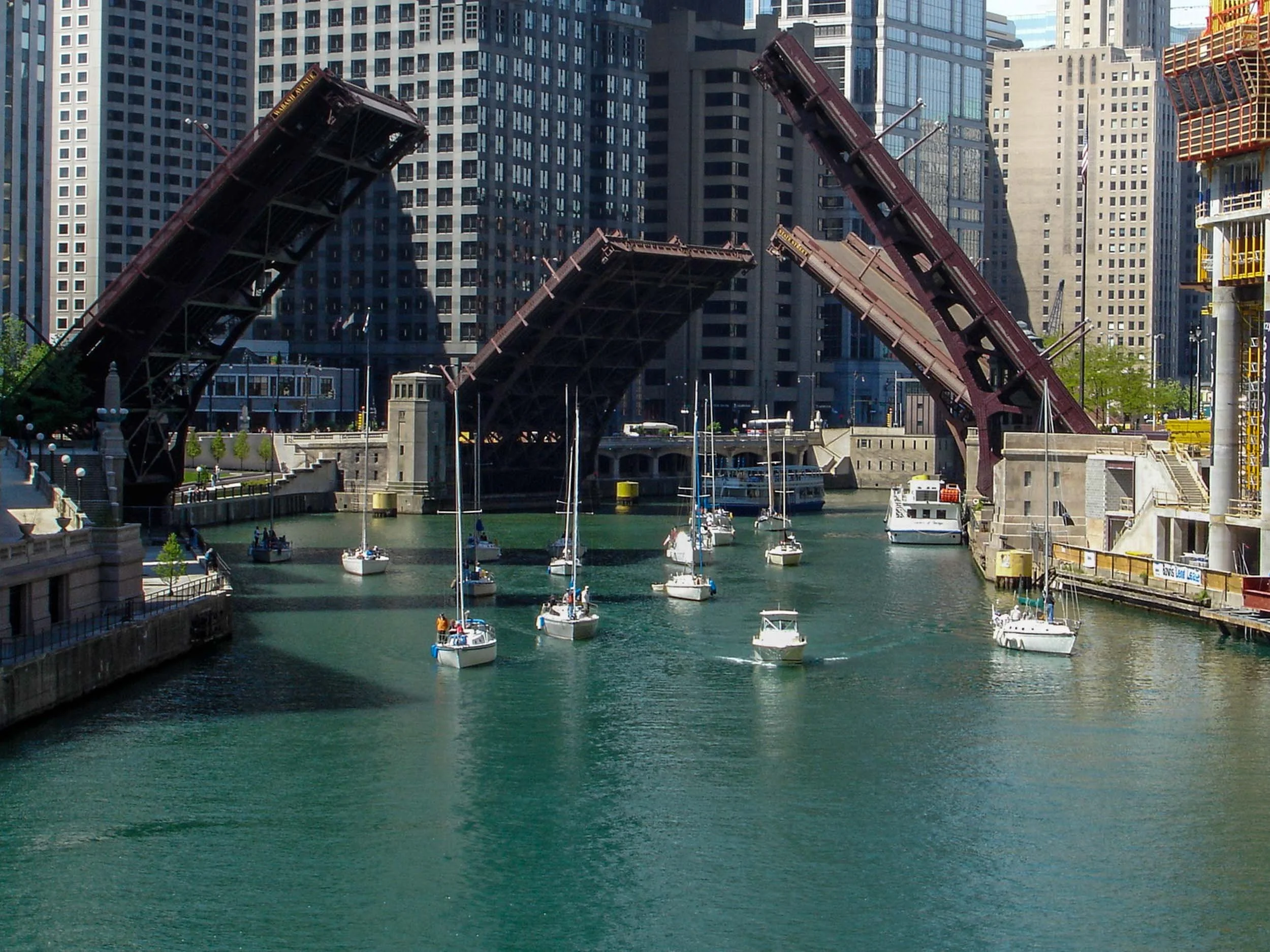 On a Saturday in early Spring the City of Chicago opens all 18 of the drawbridges over the Chicago River to allow sailboats that have been moored upriver to sail to the harbors and boat slips on Lake Michigan for the summer.