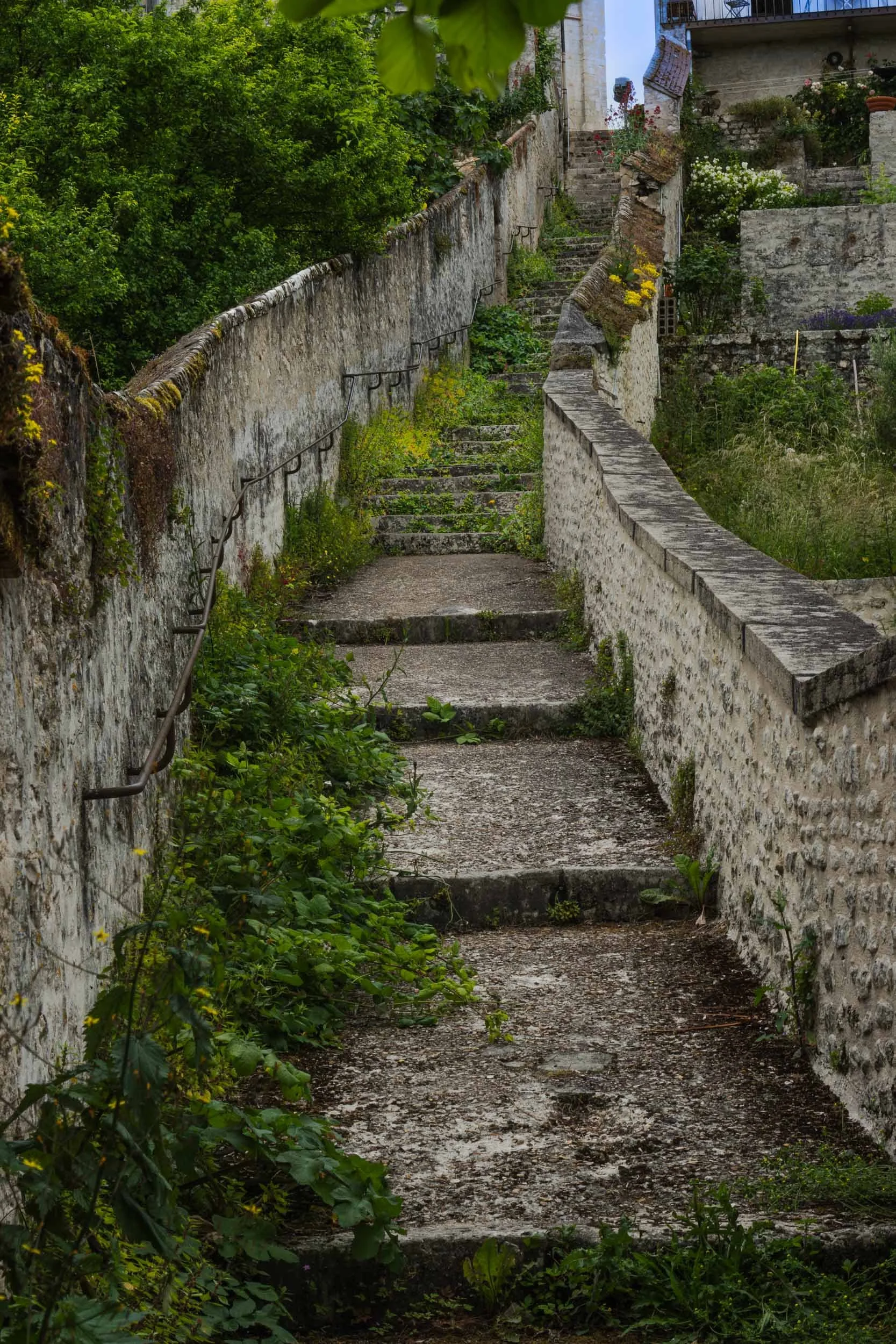 The French medieval town of Château-Landon is built on a steep hillside and this stairway leads from one section of the town to another.