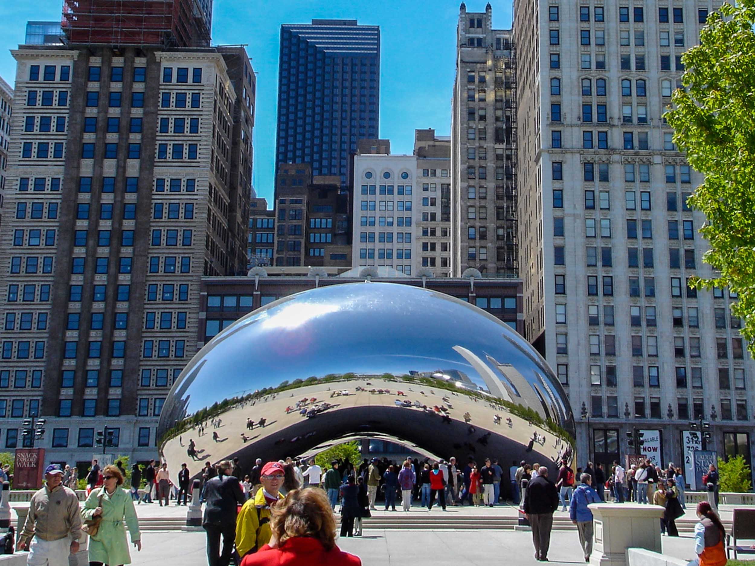 The Bean, officially named Cloud Gate, is located in the heart of downtown Chicago on the in Millennium Park. The Bean’s reflective surface was inspired by liquid mercury. This shiny exterior reflects the people moving around the park, the lights of 