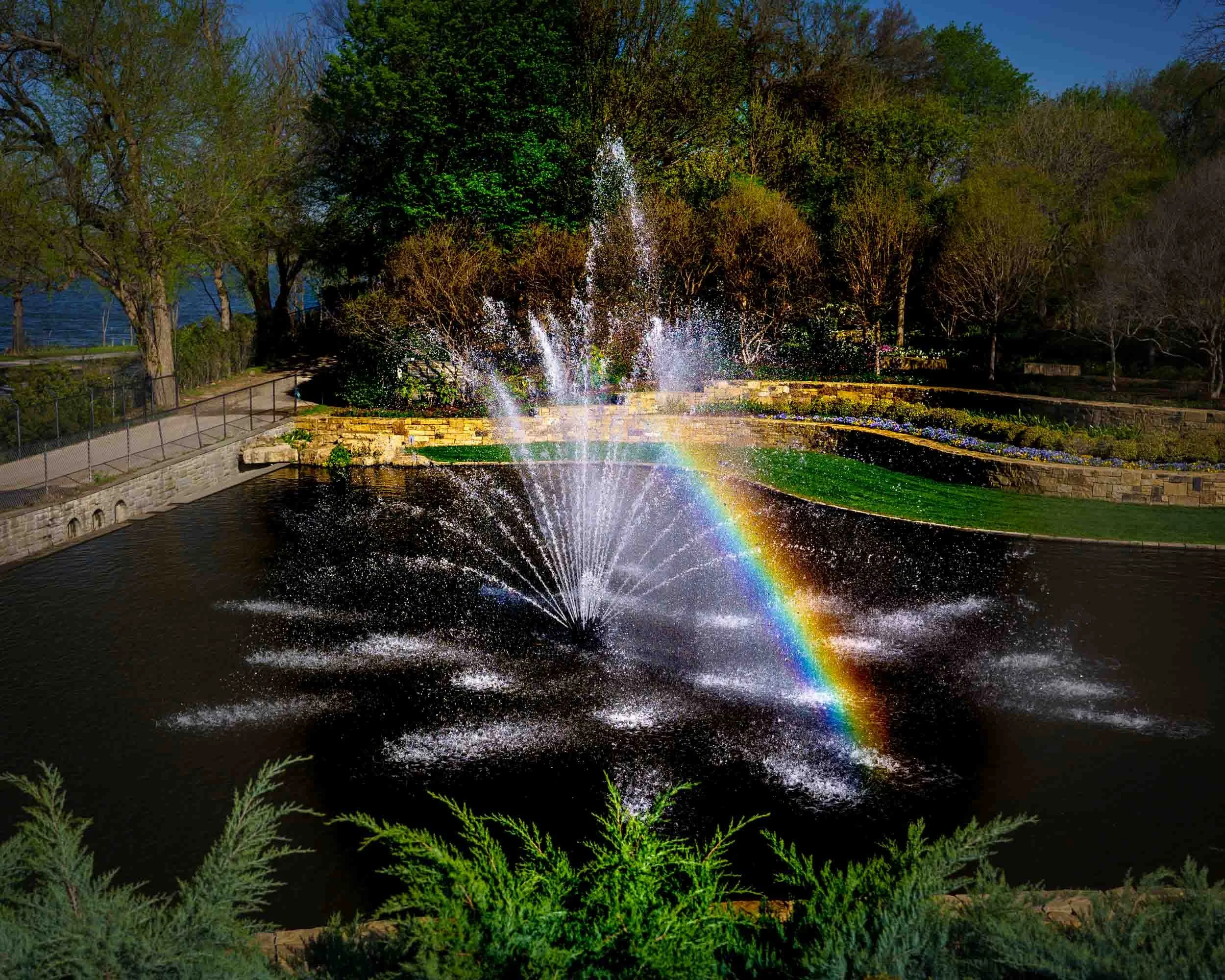 A fountain greets you when you enter the Dallas Arboretum. Fortunately for me on one visit there were a few fleeting moments when the light was just right and presented me with a rainbow to photograph.