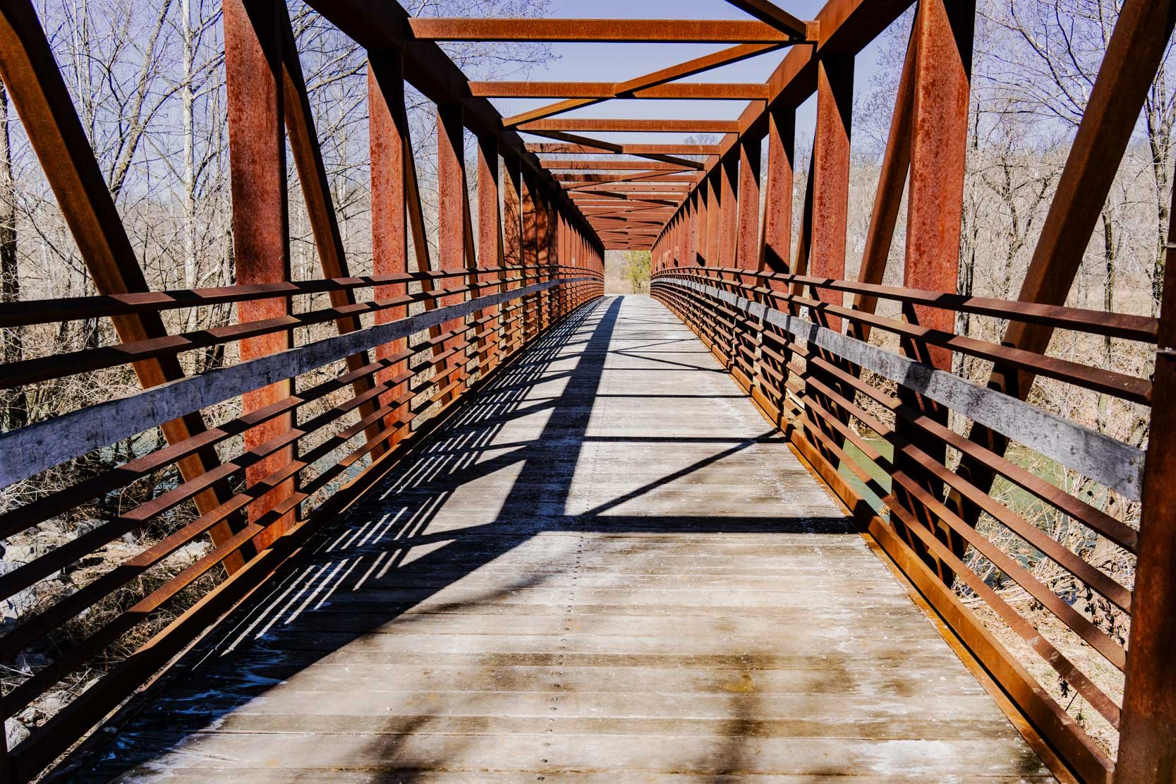 A very symmetrical pathway created by a bridge over the Roanoke River along the  "Greenway" - a project to provide safe off-road spaces for walking, running, and biking.
