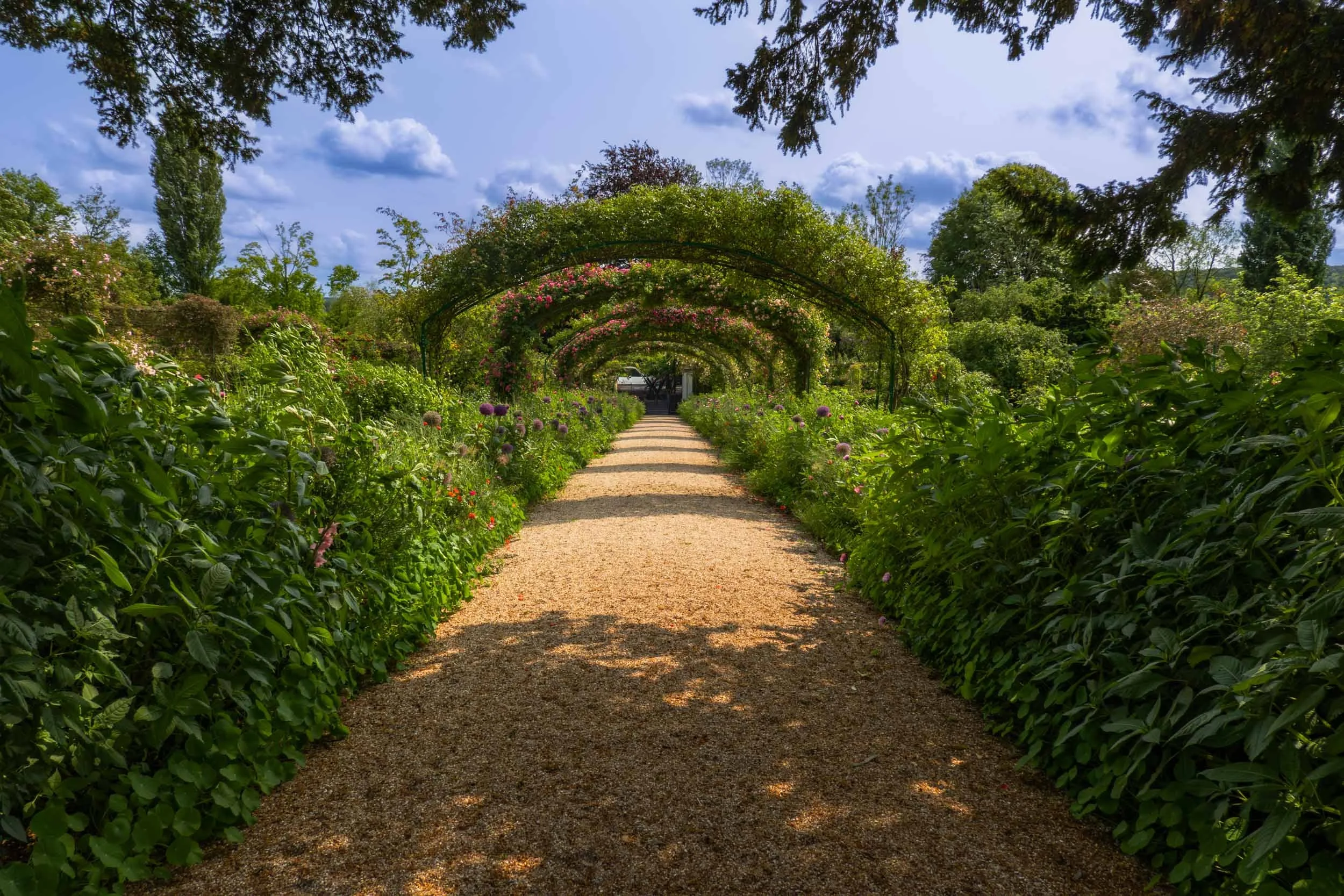 The pathway that runs through Claude Monet's garden in Giverny, France, leading up to his home.