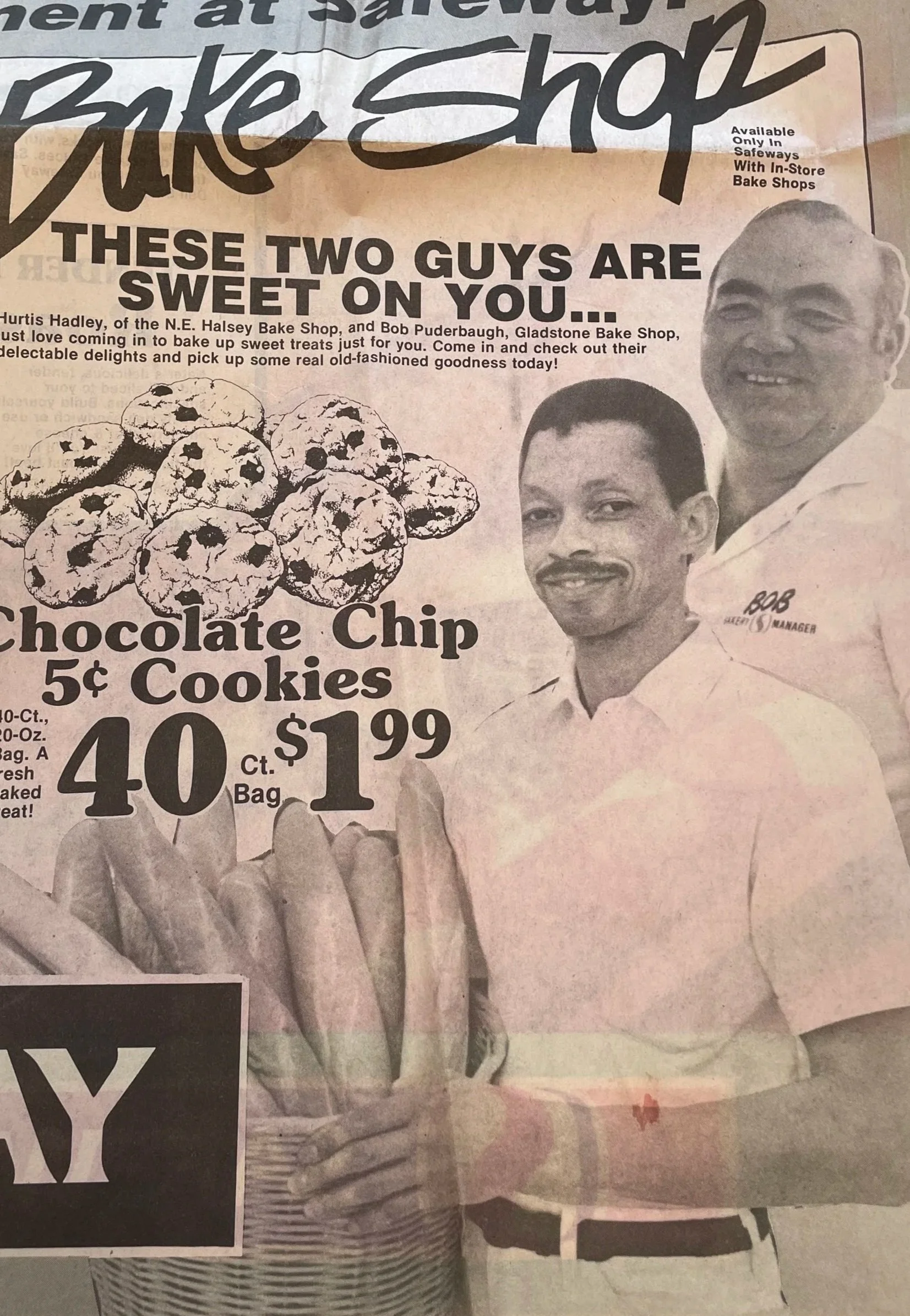 Printed avertisement with bold, black font advertising chocolate chip cookies for 5 cents each. Behind this text, Hurtis Hadley is standing in his bakers whites, holding a bag of baguettes. 