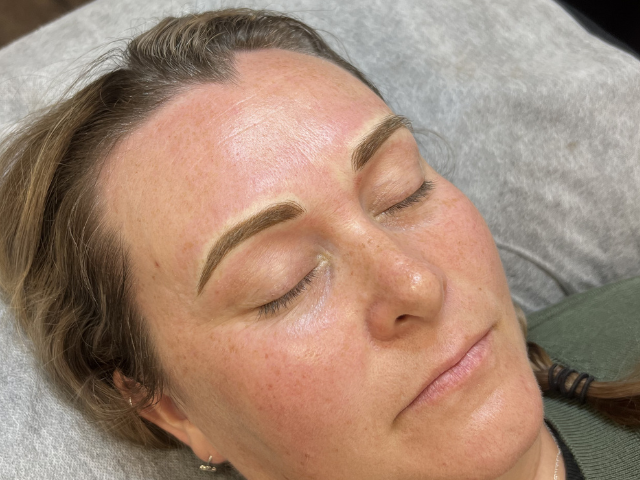 Close up of lady after cosmetic brow tattoo by banksia and blade