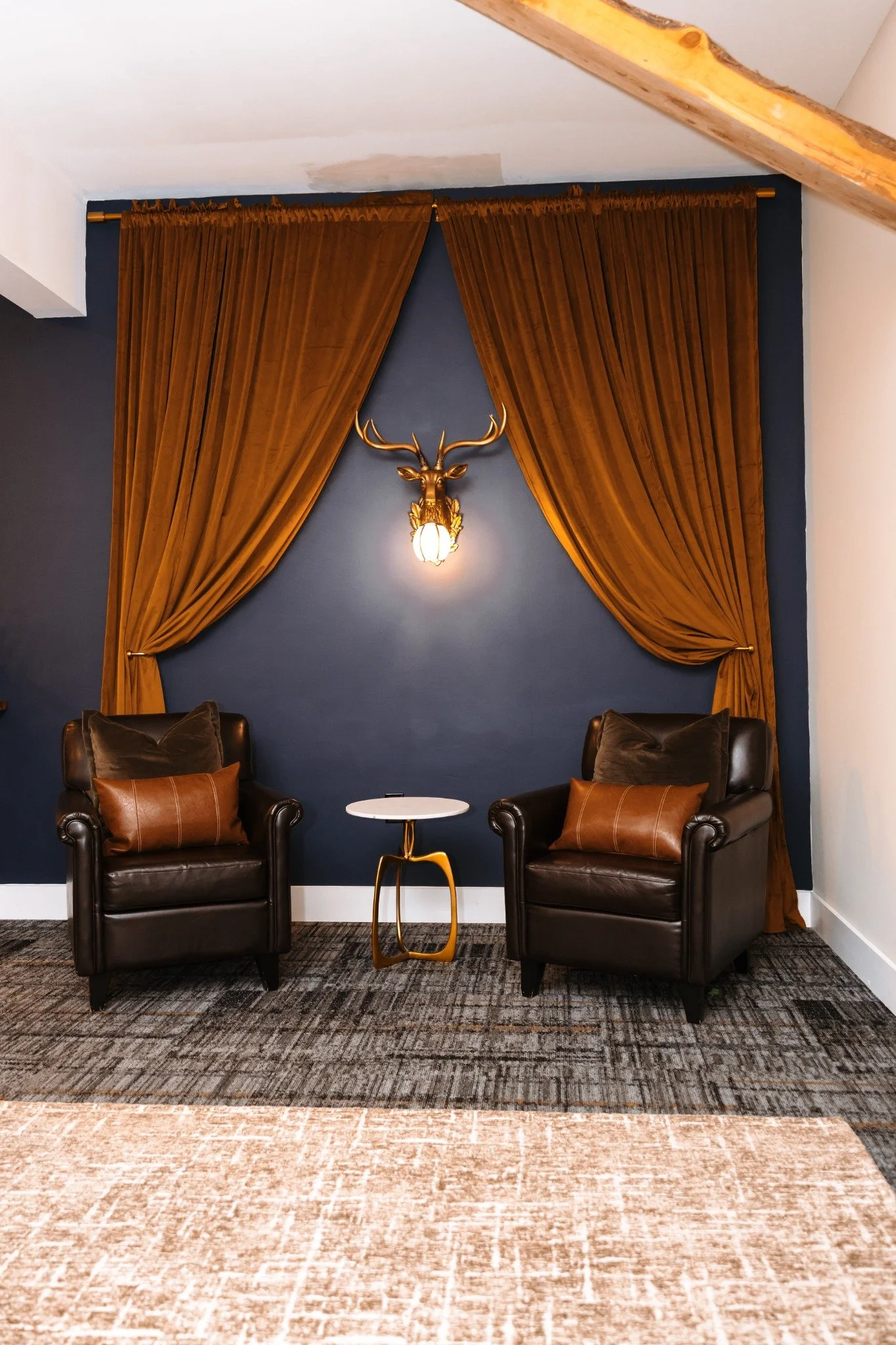 ramble-creek-grooms-quarters-seating-nook-velvet-curtains.jpg