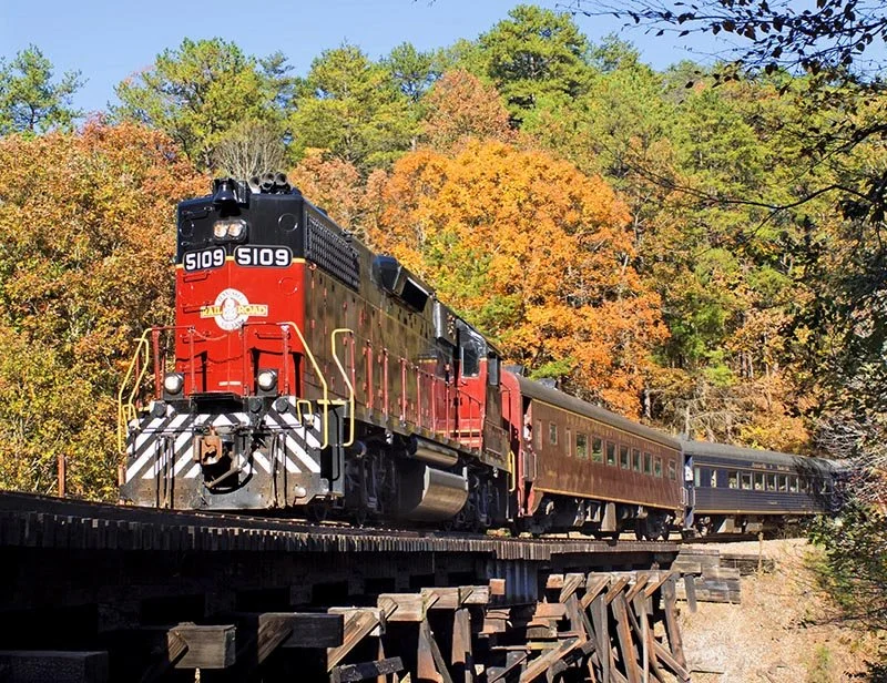 At the Hiwassee Loop, the railway circles the mountain and crosses over its own tracks, gaining elevation through a remarkable piece of railroad engineering.