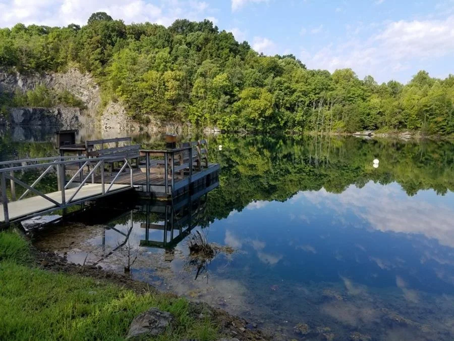 Beneath the surface of Loch Low-Minn’s quarry lake, paddlefish glide past submerged curiosities. It's a side of Athens, Tennessee, you’ll need scuba gear to explore.