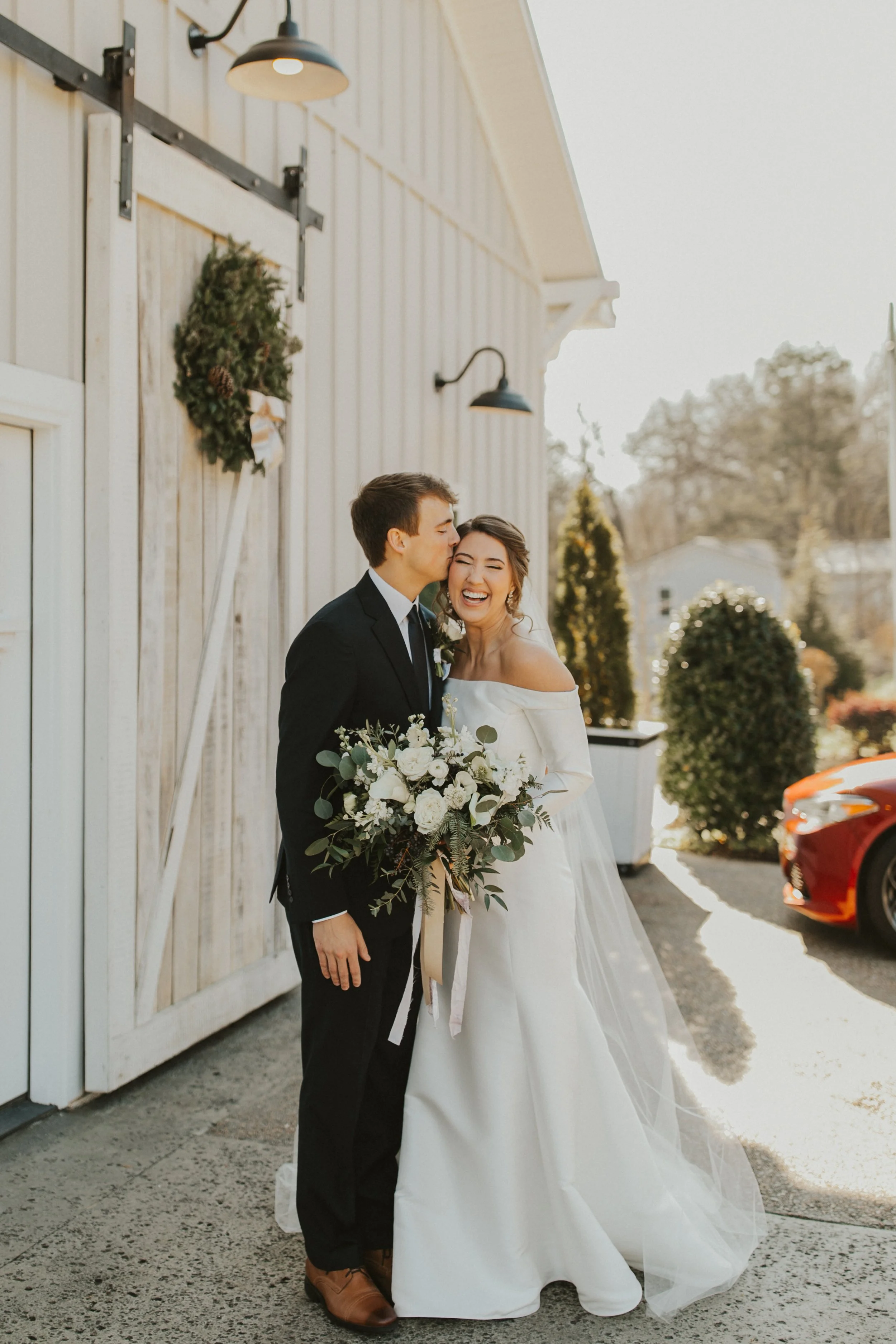 winter-wedding-couple-in-front-of-grand-hall-outdoors.jpg