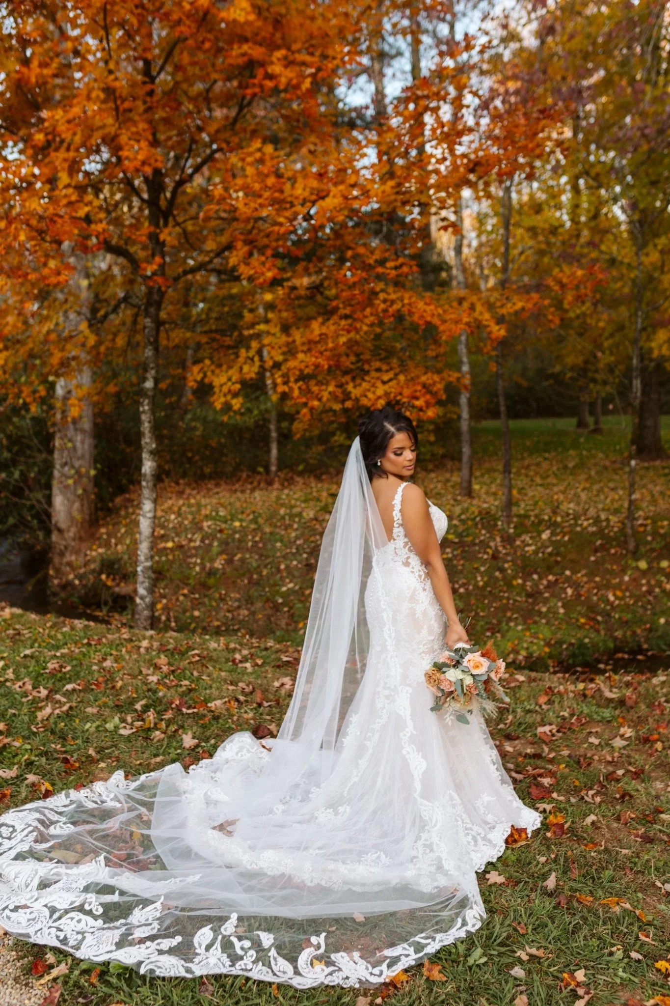 ramble-creek-fall-wedding-autumn-forest-bride-portrait.jpeg