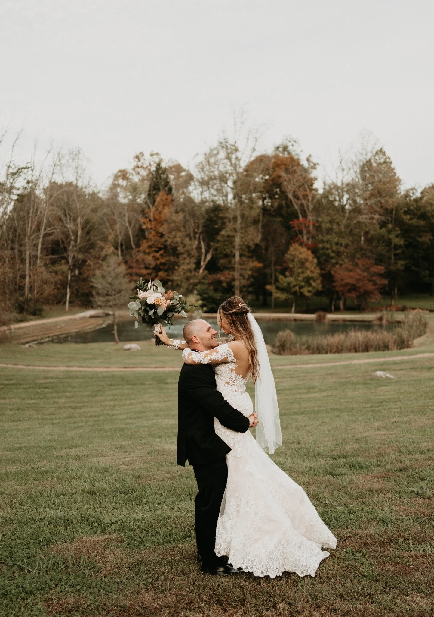 ramble-creek-fall-wedding-pond-newlywed-portrait.jpg