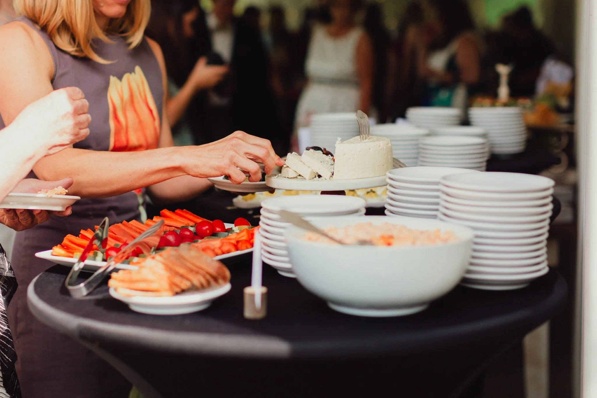 ramble-creek-wedding-cocktail-hour-guests-cheese-vegetables.jpg