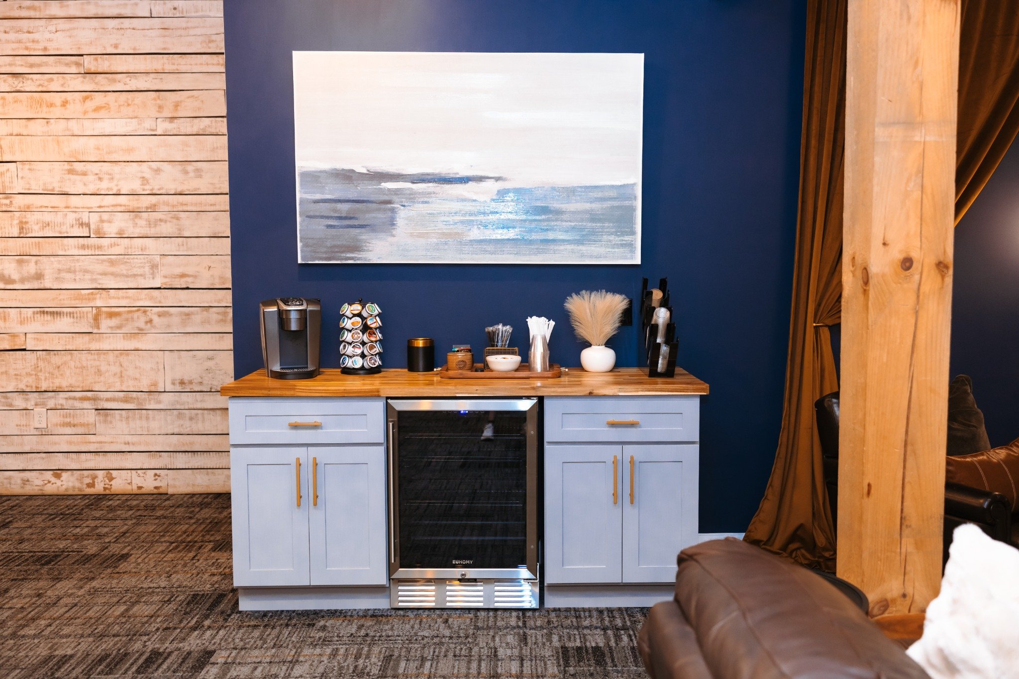 Coffee and tea bar with beverage cooler in Ramble Creek groom's quarters. Blue walls, masculine vibes, and the best all-inclusive wedding experience in East Tennessee.