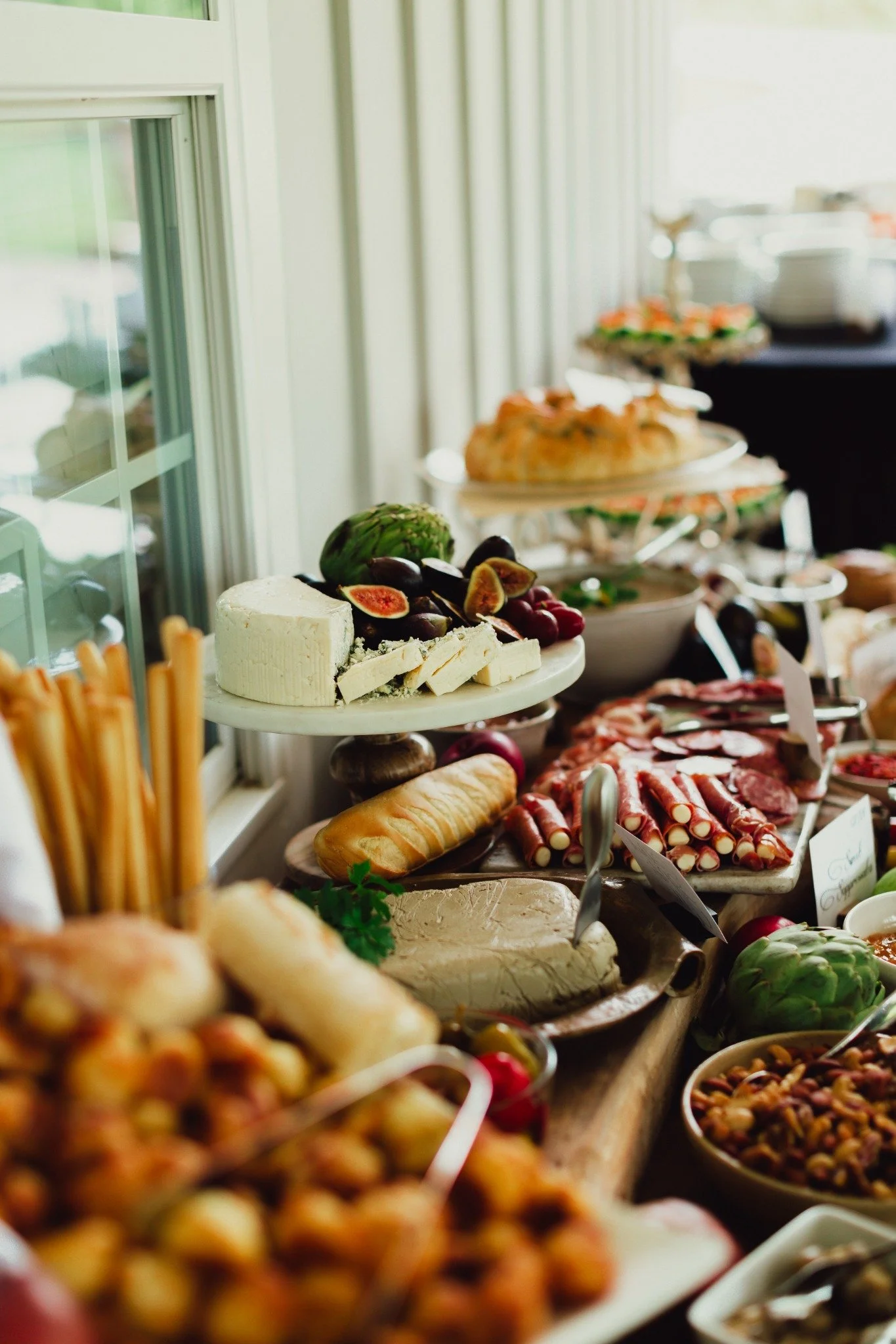 ramble-creek-wedding-cocktail-hour-cheese-charcuterie-table.jpg